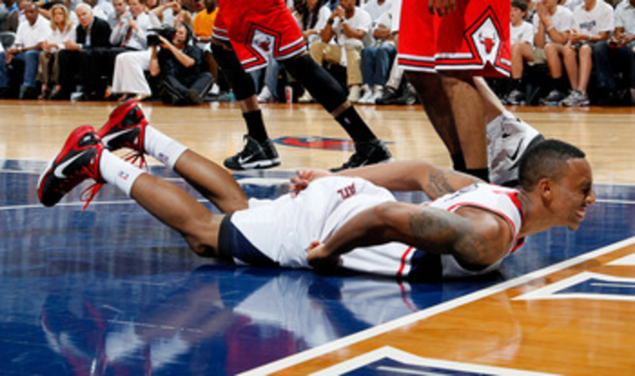 ATLANTA, GA - MAY 12: Jeff Teague #0 of the Atlanta Hawks reacts after injuring himself against the Chicago Bulls in Game Six of the Eastern Conference Semifinals in the 2011 NBA Playoffs at Phillips Arena on May 12, 2011 in Atlanta, Georgia. NOTE TO US ATLANTA, GA - MAY 12: Jeff Teague #0 of the Atlanta Hawks reacts after injuring himself against the Chicago Bulls in Game Six of the Eastern Conference Semifinals in the 2011 NBA Playoffs at Phillips Arena on May 12, 2011 in Atlanta, Georgia. NOTE TO US