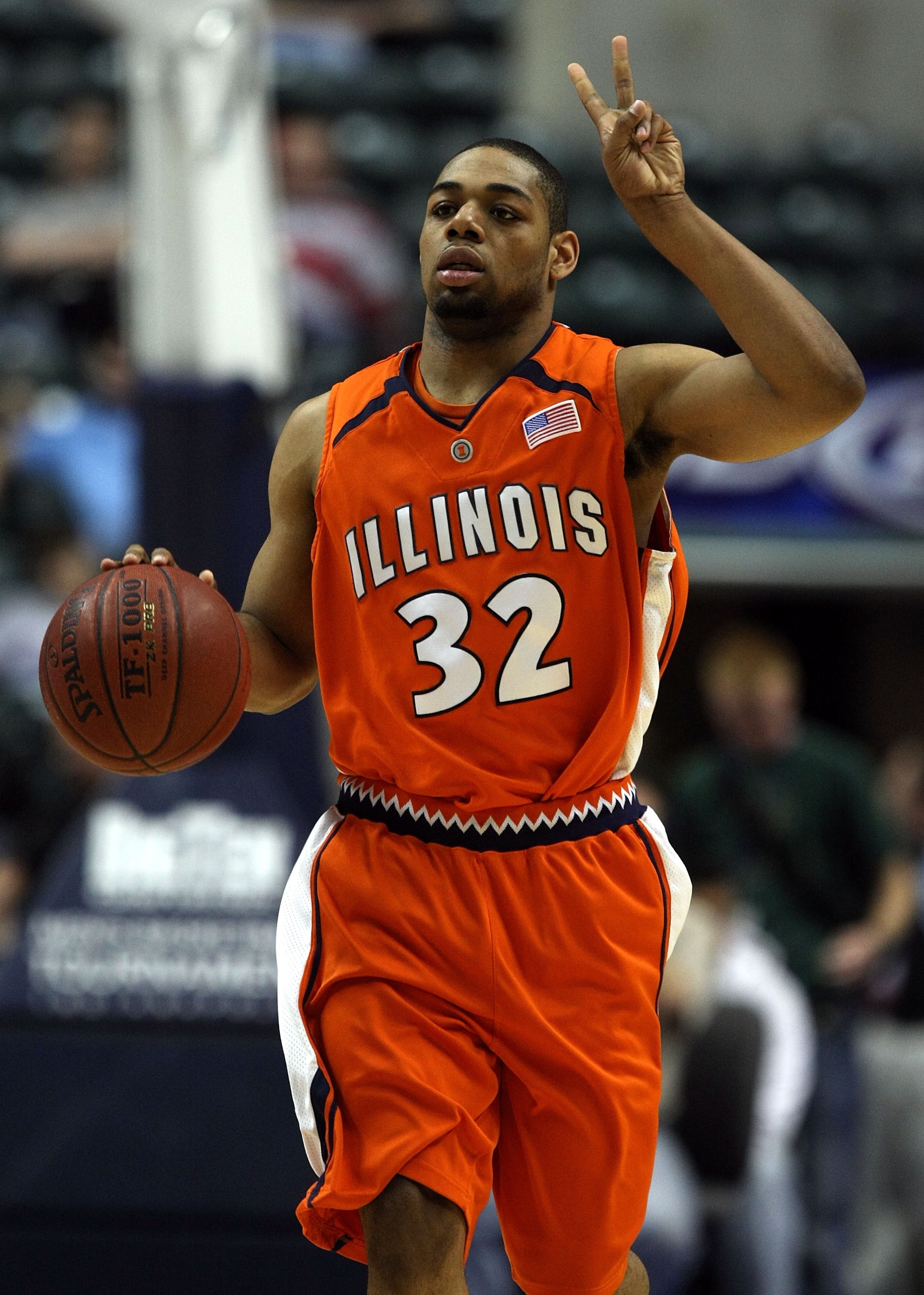 INDIANAPOLIS - MARCH 13:  Demetri McCarney #32 of the Illinois Fighting Illini calls a play as he brings the ball up court against the Penn State Nittany Lions during the Big Ten Men's Basketball Tournament at Conseco Fieldhouse on March 13, 2008 in India