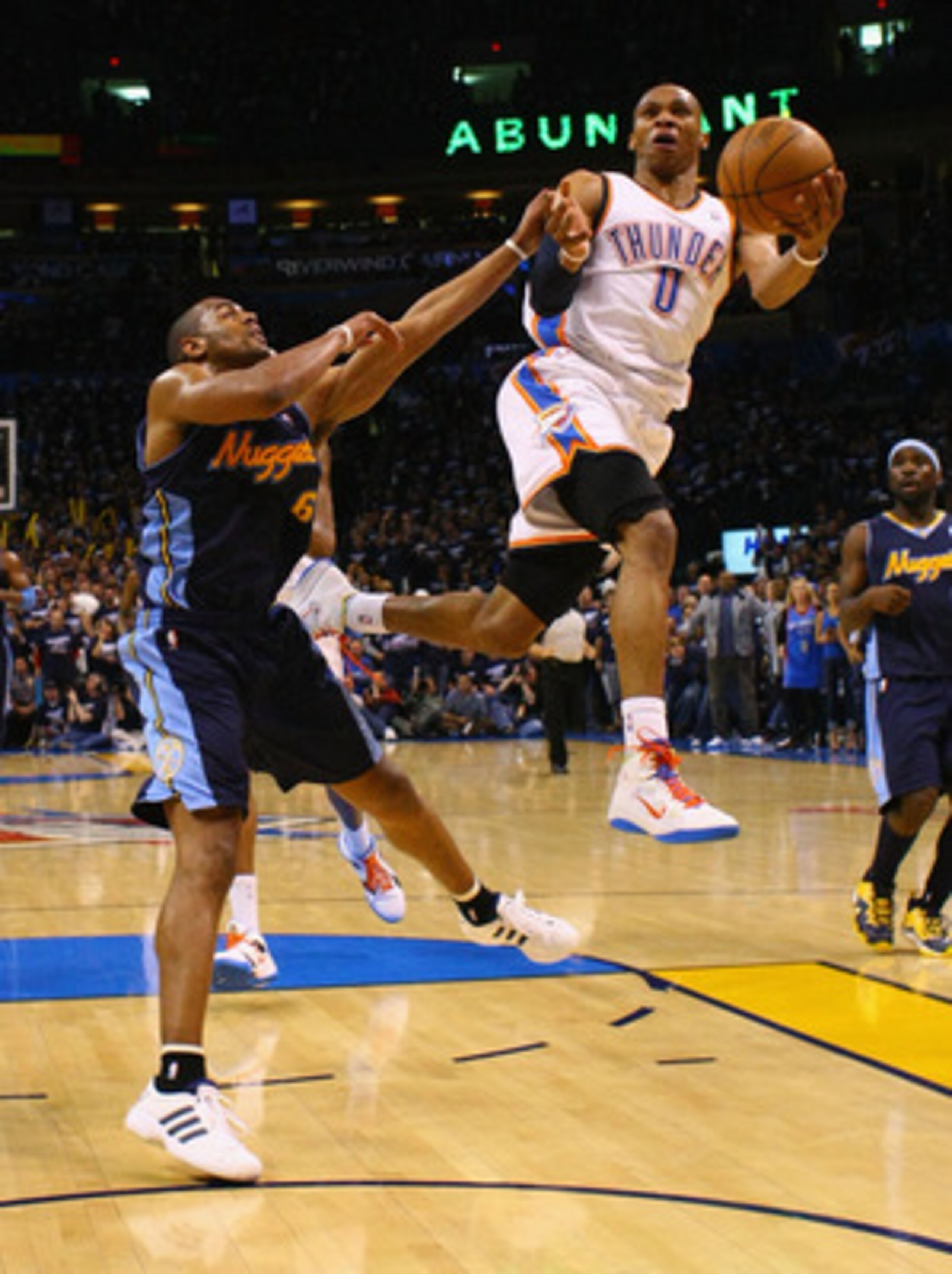 OKLAHOMA CITY, OK - APRIL 27: Russell Westbrook #0 of the Oklahoma City Thunder drives to the basket against Arron Afflalo #6 of the Denver Nuggets in Game Five of the Western Conference Quarterfinals in the 2011 NBA Playoffs on April 27, 2011 at the Ford OKLAHOMA CITY, OK - APRIL 27: Russell Westbrook #0 of the Oklahoma City Thunder drives to the basket against Arron Afflalo #6 of the Denver Nuggets in Game Five of the Western Conference Quarterfinals in the 2011 NBA Playoffs on April 27, 2011 at the Ford