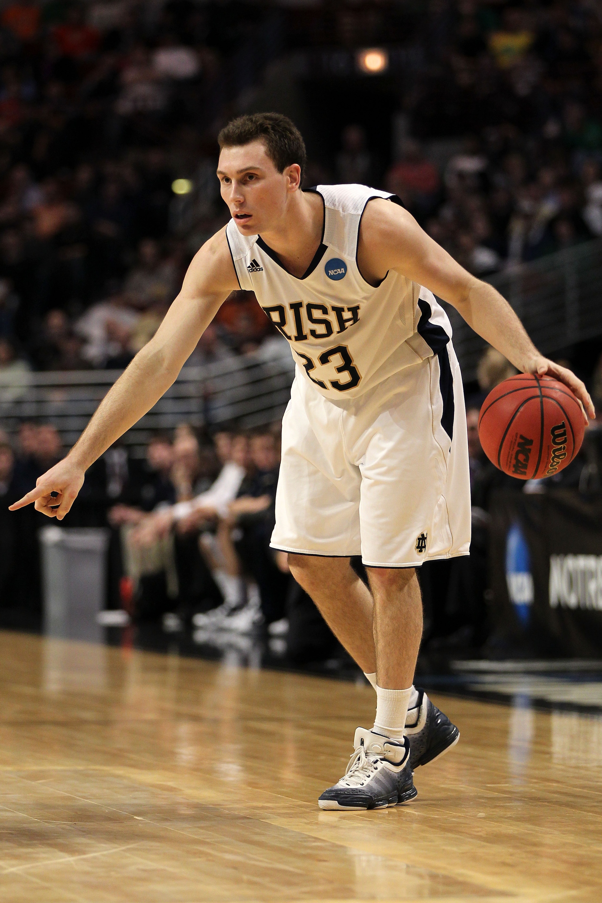 CHICAGO, IL - MARCH 20:  Ben Hansbrough #23 of the Notre Dame Fighting Irish communicates with teammates in the first half against the Florida State Seminoles during the third round of the 2011 NCAA men's basketball tournament at the United Center on Marc