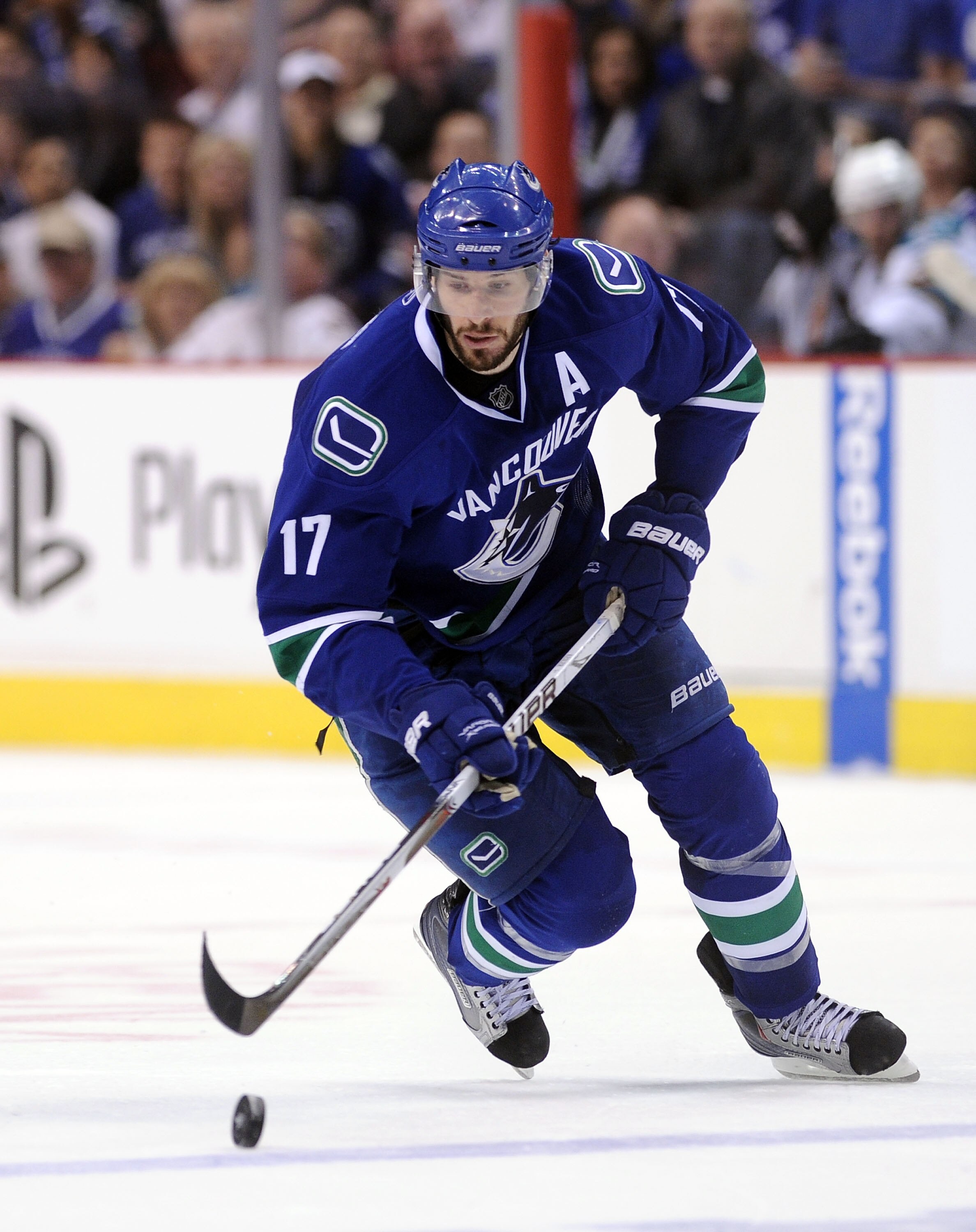 VANCOUVER, CANADA - MAY 18:  Ryan Kesler #17 of the Vancouver Canucks skates the puck across the blue line in Game Two of the Western Conference Finals against the San Jose Sharks during the 2011 Stanley Cup Playoffs at Rogers Arena on May 18, 2011 in Van