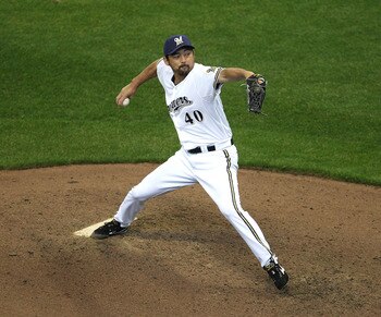 MILWAUKEE, WI - APRIL 04: Takashi Saito #40 of the Milwaukee Brewers gave up two solo home runs in the 8th inning to the Atlanta Braves during the home opener at Miller Park on April 4, 2011 in Milwaukee, Wisconsin. The Braves defeated the Brewers 2-1. (P