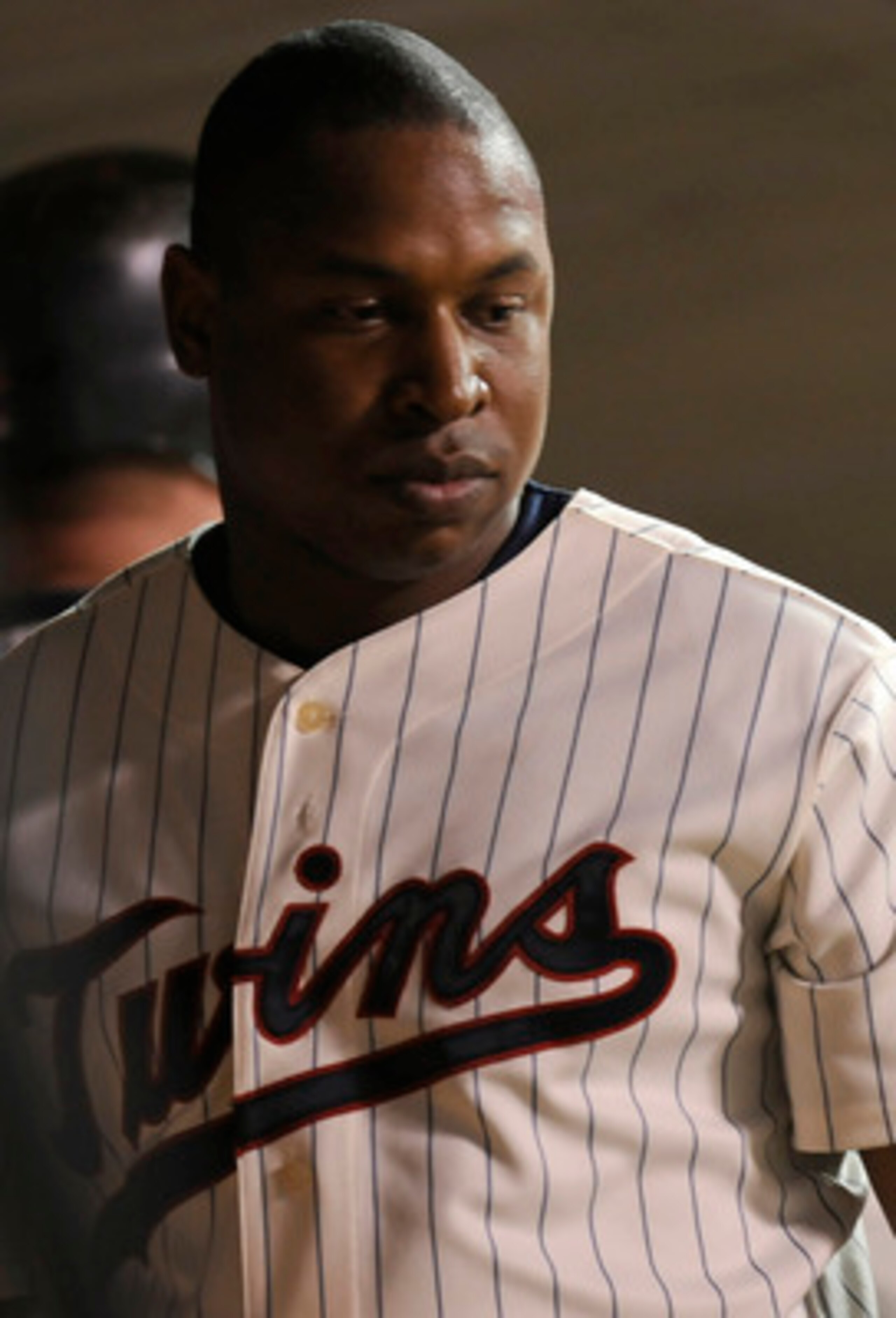 MINNEAPOLIS, MN - OCTOBER 7: Delmon Young #21 of the Minnesota Twins in the dugout following a 2-5 loss to the New York Yankees in game two of the ALDS game on October 7, 2010 at Target Field in Minneapolis, Minnesota. (Photo by Hannah Foslien /Getty Imag