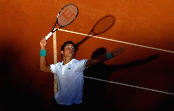 ROME, ITALY - MAY 08: Milos Raonic of Canada serves during his frist round match against Fernando Verdasco of Spain on day one of the Internazoinali BNL D'Italia at the Foro Italico Tennis Centre on May 8, 2011 in Rome, Italy.  (Photo by Clive Brunskill/G