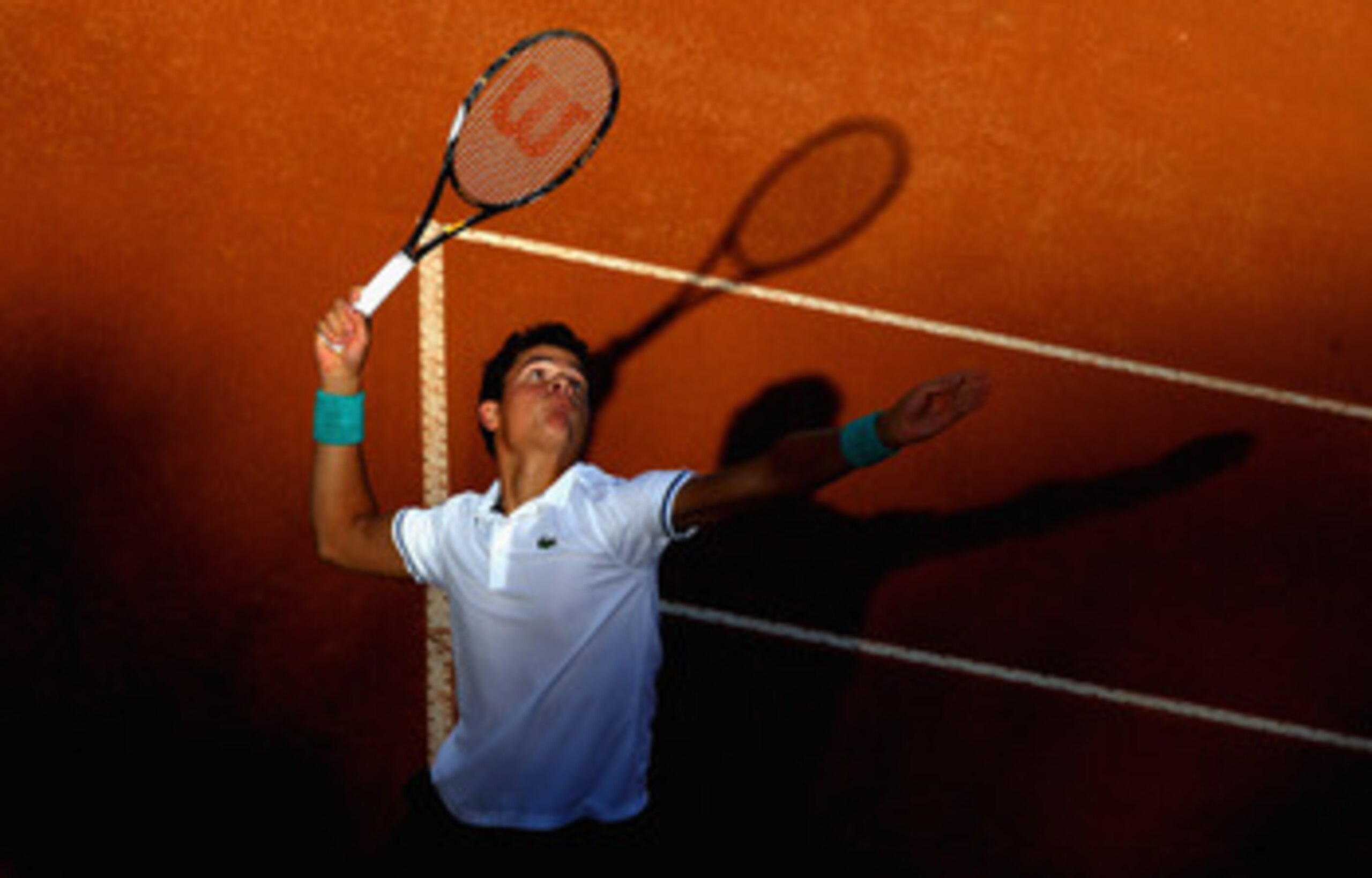 ROME, ITALY - MAY 08: Milos Raonic of Canada serves during his frist round match against Fernando Verdasco of Spain on day one of the Internazoinali BNL D'Italia at the Foro Italico Tennis Centre on May 8, 2011 in Rome, Italy.  (Photo by Clive Brunskill/G