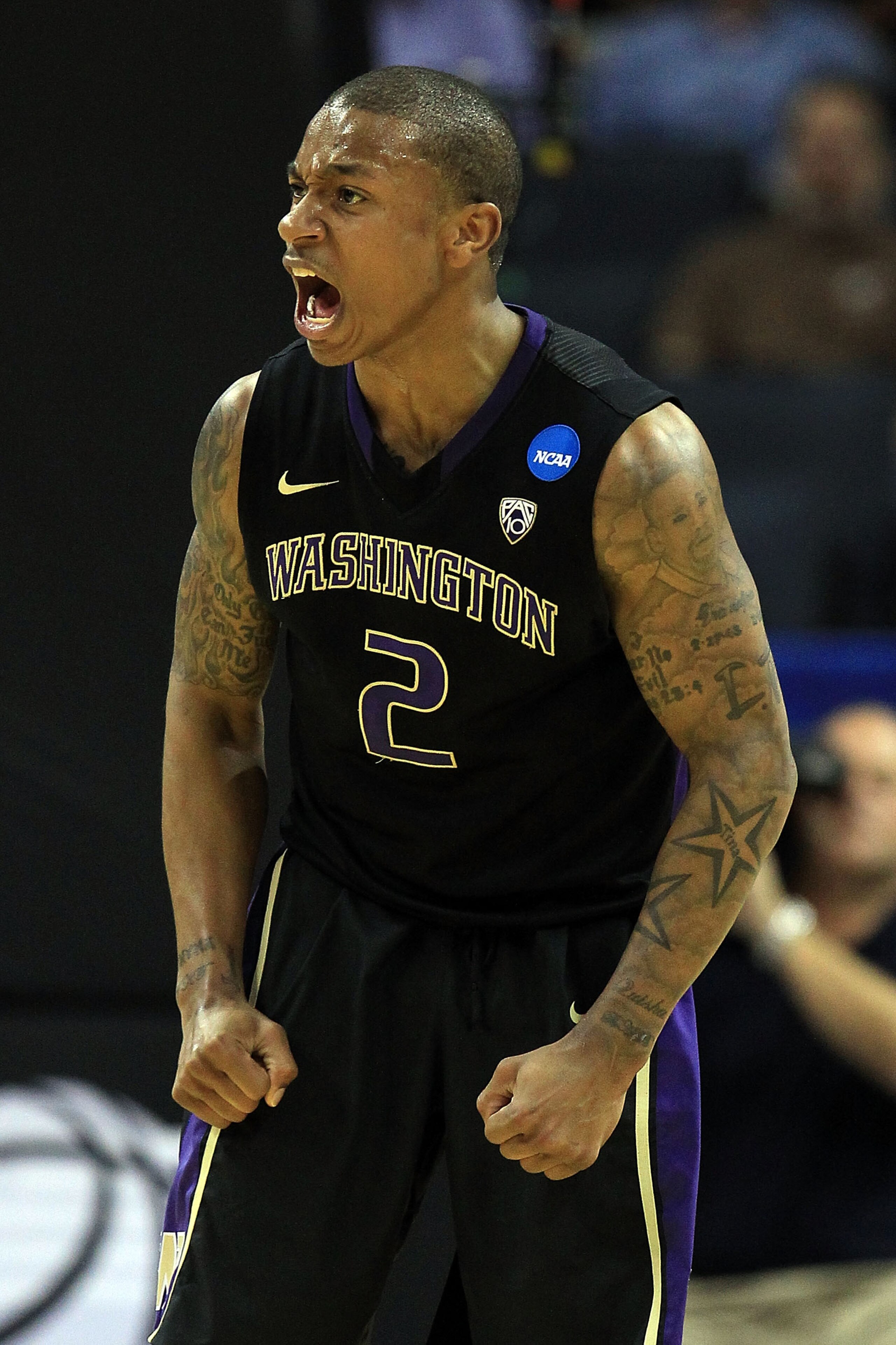 CHARLOTTE, NC - MARCH 20:  Isaiah Thomas #2 of the Washington Huskies reacts in the second half while taking on the North Carolina Tar Heels during the third round of the 2011 NCAA men's basketball tournament at Time Warner Cable Arena on March 20, 2011 i