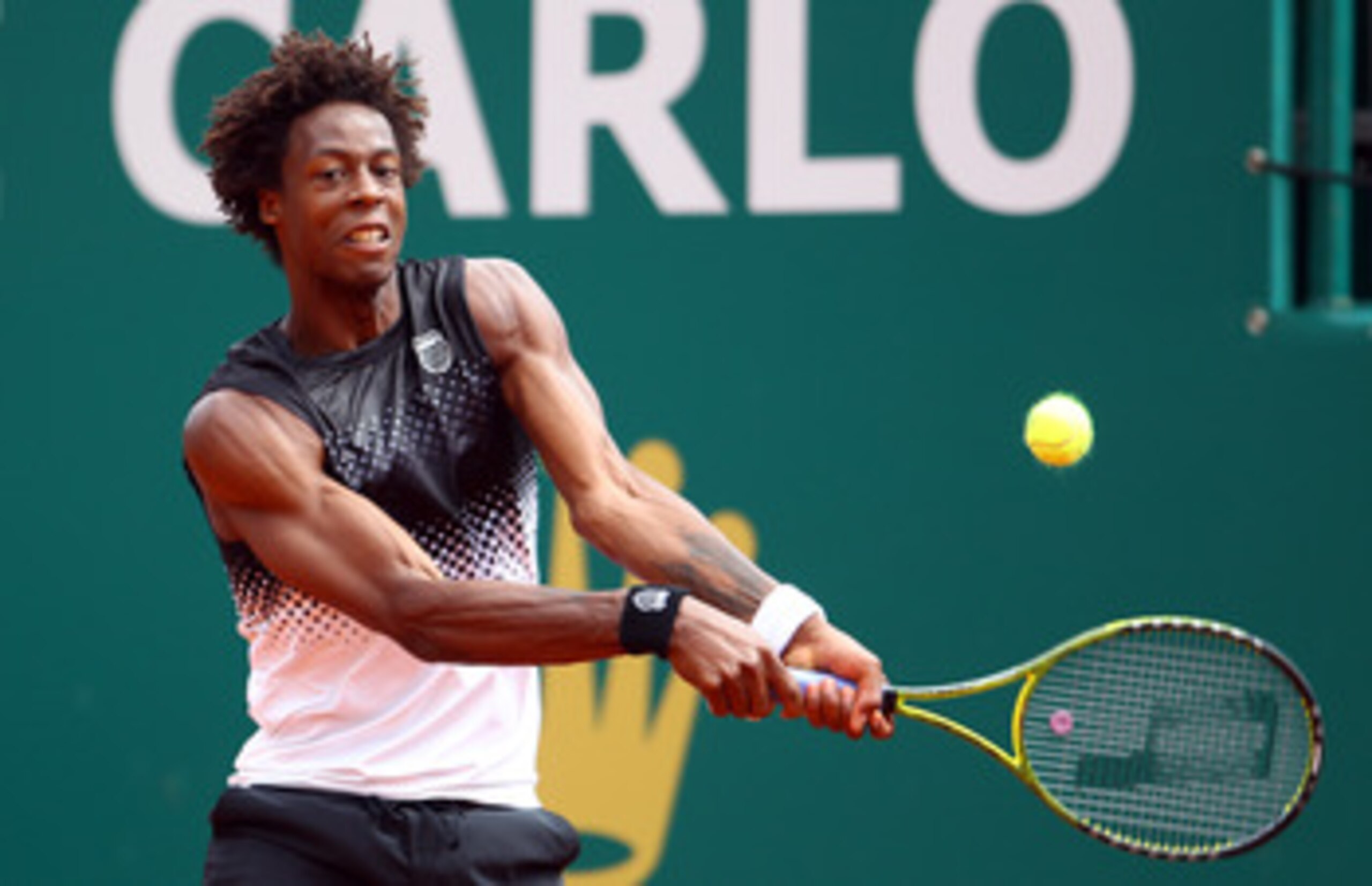 MONACO - APRIL 13:  Gael Monfils of France in action against Daniel Gimeno-Traver of Spain during Day Four of the ATP Masters Series Tennis at the Monte Carlo Country Club on April 13, 2011 in Monte Carlo, Monaco.  (Photo by Julian Finney/Getty Images)