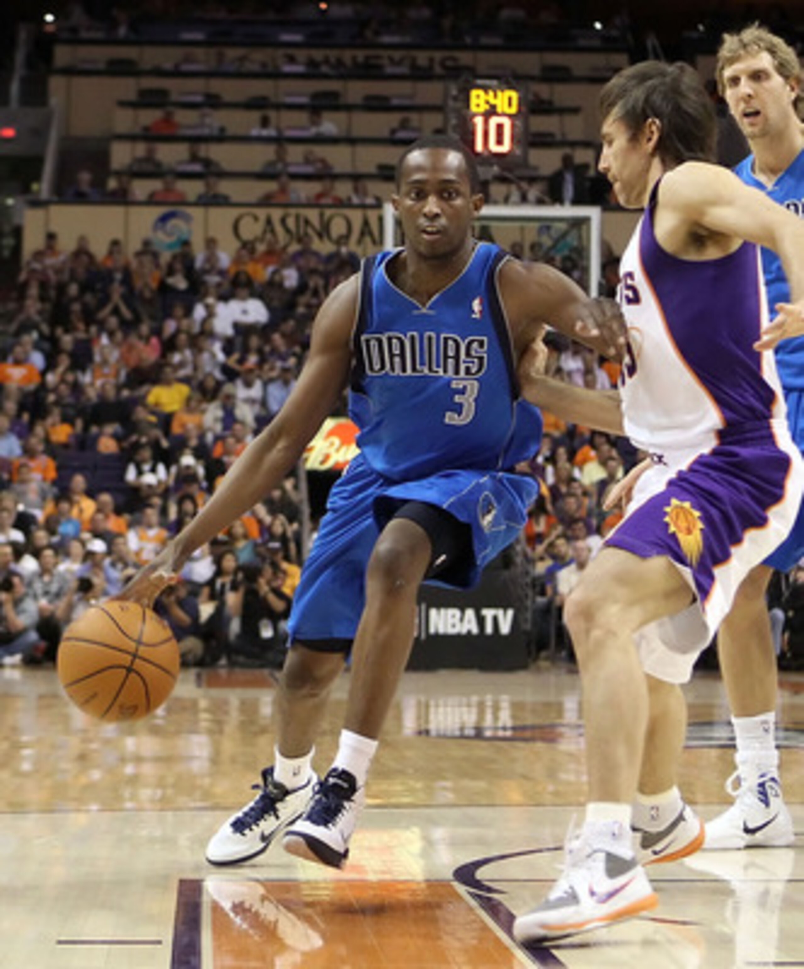 PHOENIX, AZ - MARCH 27:  Rodrigue Beaubois #3 of the Dallas Mavericks drives the ball past Steve Nash #13 of the Phoenix Suns during the NBA game at US Airways Center on March 27, 2011 in Phoenix, Arizona.  NOTE TO USER: User expressly acknowledges and ag
