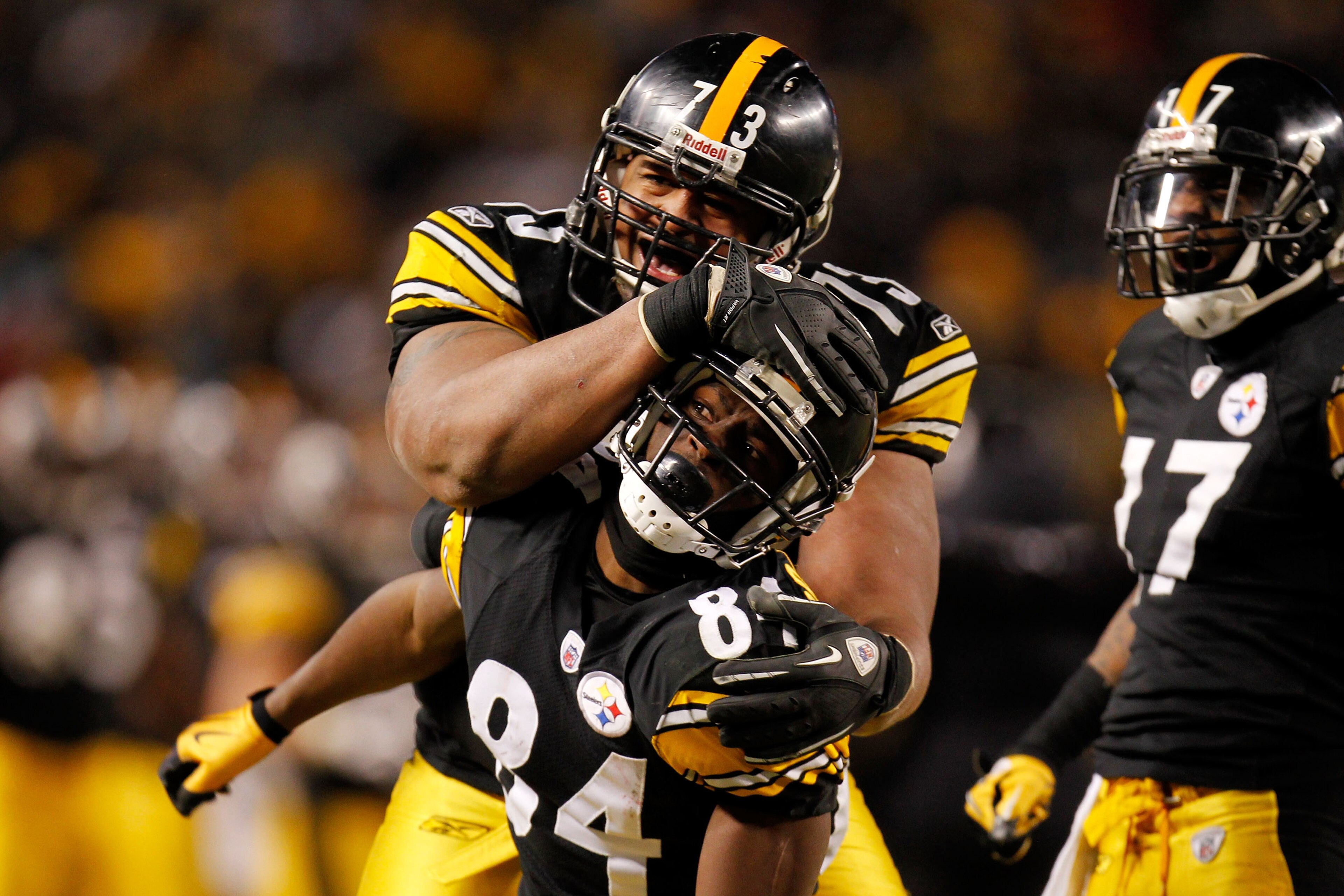 PITTSBURGH, PA - JANUARY 23:  Antonio Brown #84 and Ramon Foster #73 of the Pittsburgh Steelers celebrate during the 2011 AFC Championship game against the New York Jets at Heinz Field on January 23, 2011 in Pittsburgh, Pennsylvania.  (Photo by Gregory Sh