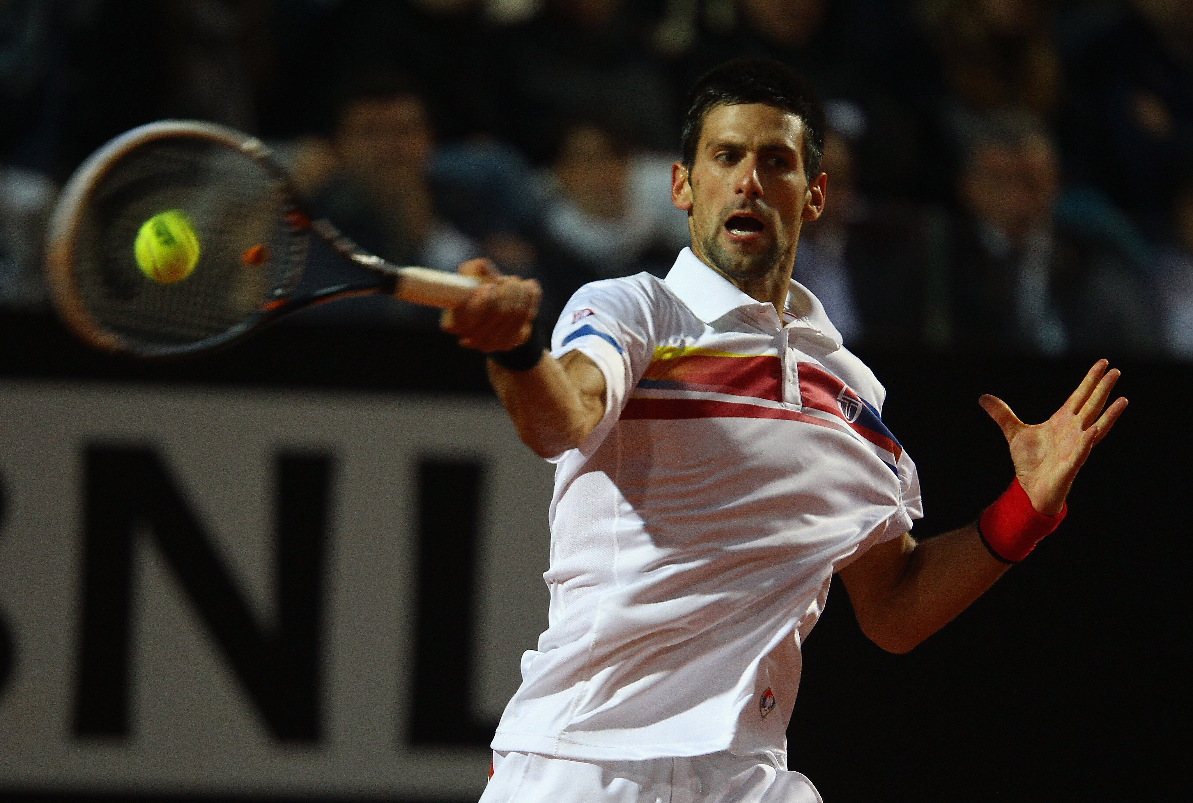 ROME, ITALY - MAY 15: Novak Djokovic of Serbia in action during the final against Rafael Nadal of Spain during day eight of the Internazoinali BNL D'Italia at the Foro Italico Tennis Centre on May 15, 2011 in Rome, Italy. (Photo by Clive Brunskill/Getty ROME, ITALY - MAY 15: Novak Djokovic of Serbia in action during the final against Rafael Nadal of Spain during day eight of the Internazoinali BNL D'Italia at the Foro Italico Tennis Centre on May 15, 2011 in Rome, Italy. (Photo by Clive Brunskill/Getty