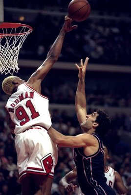 26 Apr 1998:  Dennis Rodman #91 of the Chicago Bulls and Rony Seikaly #2 of the New Jersey Nets jump for the ball during a First Round Playoff Game at the United Center in Chicago, Illinois. The Bulls defeated the Nets 96-91.