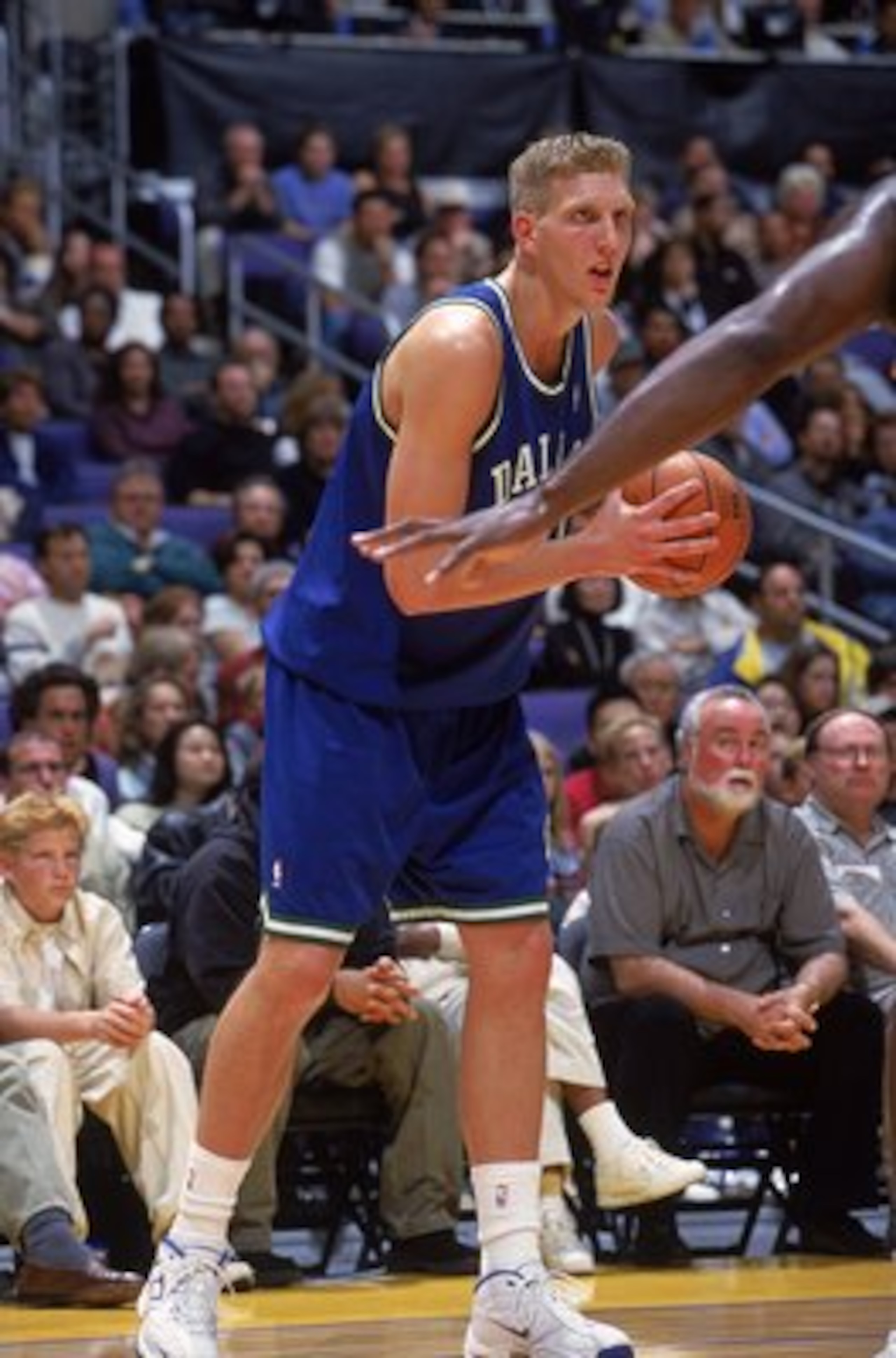 7 Nov 1999:  Dirk Nowitzki #41 of the Dallas Mavericks stands with the ball during the game against the Los Angeles Lakers at the Staples Center in Los Angeles, California. The Lakers defeated the Mavericks 105-97.   Mandatory Credit: Donald Miralle  /All