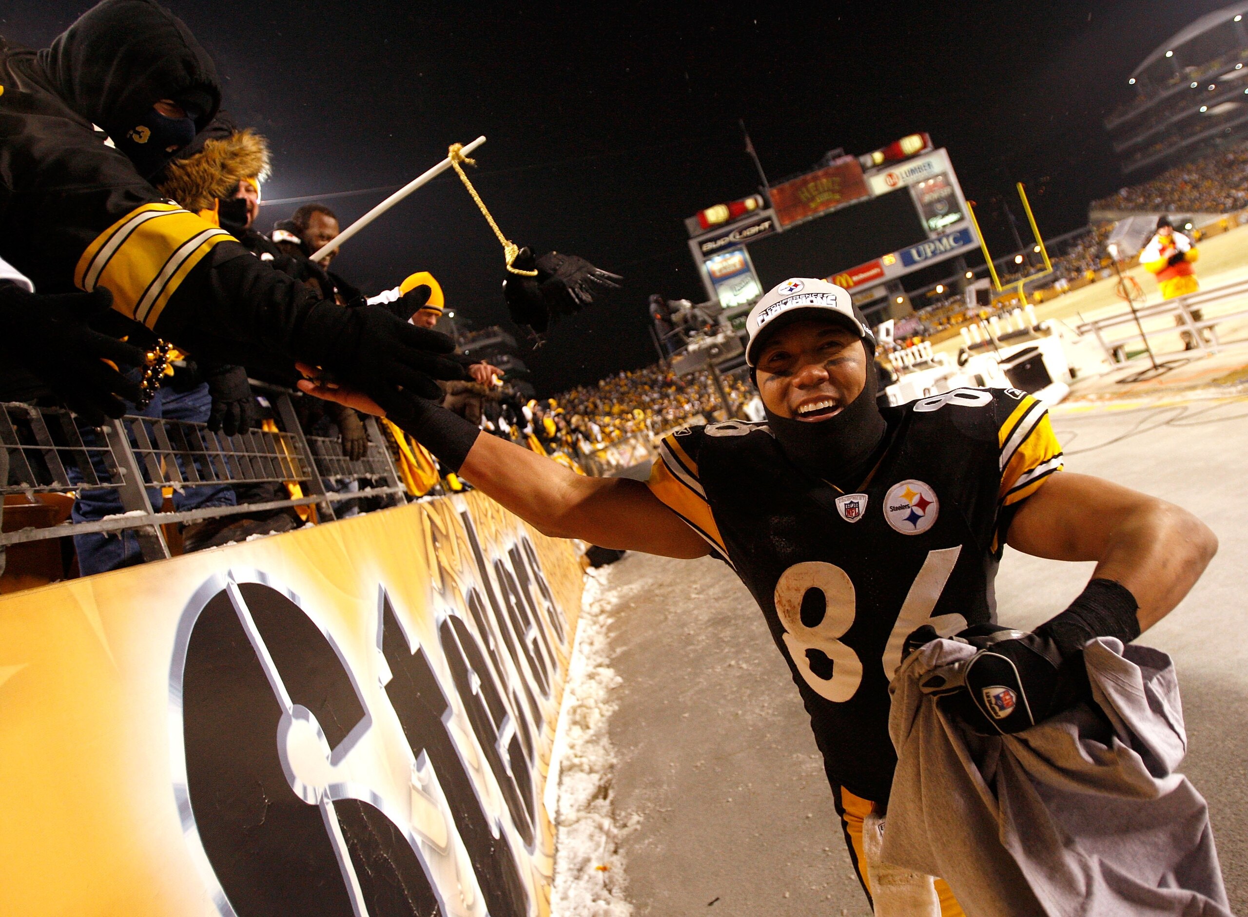 PITTSBURGH - JANUARY 18:  Hines Ward #86 of the Pittsburgh Steelers celebrates with fans after their 23-14 win against the Baltimore Ravens during the AFC Championship game on January 18, 2009 at Heinz Field in Pittsburgh, Pennsylvania.  (Photo by Streete