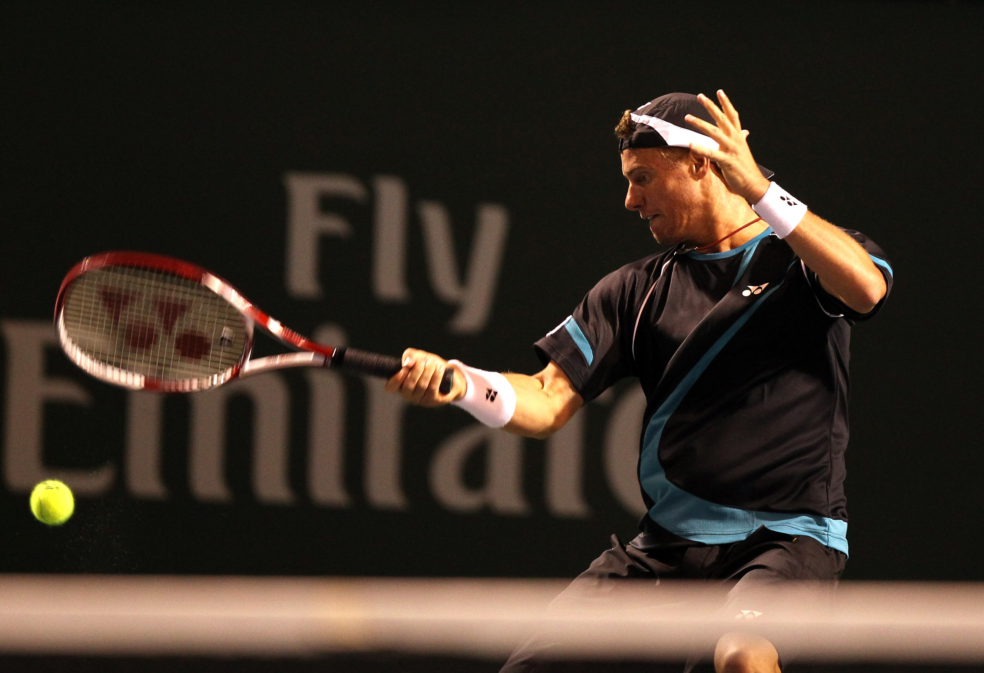 INDIAN WELLS, CA - MARCH 11: Lleyton Hewitt of Australia returns a shot to Yen-Hsun Lu of Chinese Taipei during the BNP Paribas Open at the Indian Wells Tennis Garden on March 11, 2011 in Indian Wells, California. (Photo by Ezra Shaw/Getty Images) INDIAN WELLS, CA - MARCH 11: Lleyton Hewitt of Australia returns a shot to Yen-Hsun Lu of Chinese Taipei during the BNP Paribas Open at the Indian Wells Tennis Garden on March 11, 2011 in Indian Wells, California. (Photo by Ezra Shaw/Getty Images)