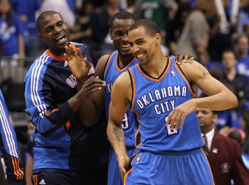 DALLAS, TX - MAY 19:  (R-L) Thabo Sefolosha #2, Serge Ibaka #9 and Nazr Mohammed #8 of the Oklahoma City Thunder react late in the fourth quarter before the Thunder defeat the Dallas Mavericks 106-100 in Game Two of the Western Conference Finals during th