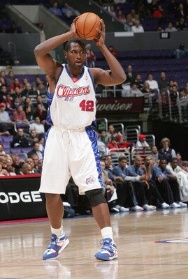 LOS ANGELES - DECEMBER 6:   Elton Brand #42 of the Los Angeles Clippers controls the ball against the Charlotte Bobcats during the game on December 6, 2004 at Staples Center in Los Angeles, California.  The Clippers won 99-93 in overtime. NOTE TO USER: Us