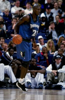 15 Feb 1999:  Kevin Garnett #21 of the Minnesota Timberwolves in action during the game against the Golden State Warriors at the Oakland Arena in Oakland, California. The Warriors defeated the Timberwolves 101-99.  Mandatory Credit: Todd Warshaw  /Allspor