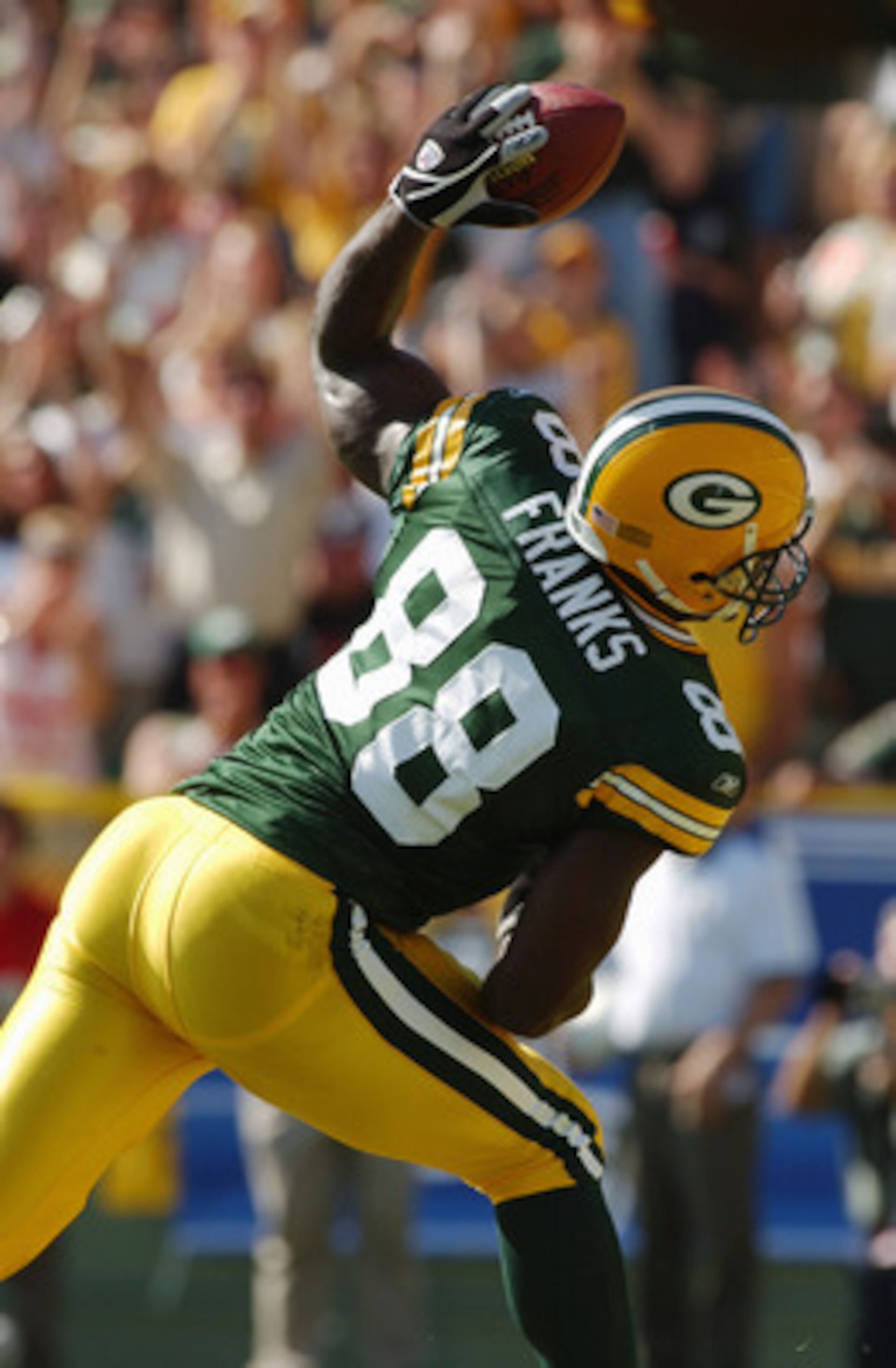 GREEN BAY, WI - SEPTEMBER 19:  Tight end Bubba Franks #88 of the Green Bay Packers spikes the ball during the game against the Chicago Bears on September 19, 2004 at Lambeau Field in Green Bay, Wisconsin. The Bears defeated the Packers 21-10. (Photo by Jo