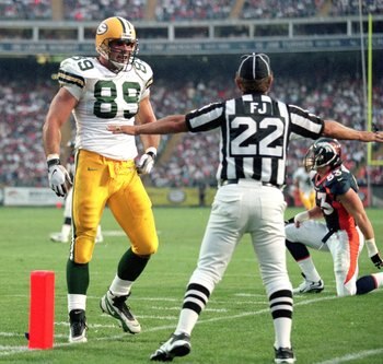 24 Aug 1998: Mark Chmura #89 of the Green Bay Packers walks towards an official during a game against the Denver Broncos at the Mile High Stadium in Denver, Colorado. The Broncos defeated the Packers 34-31.