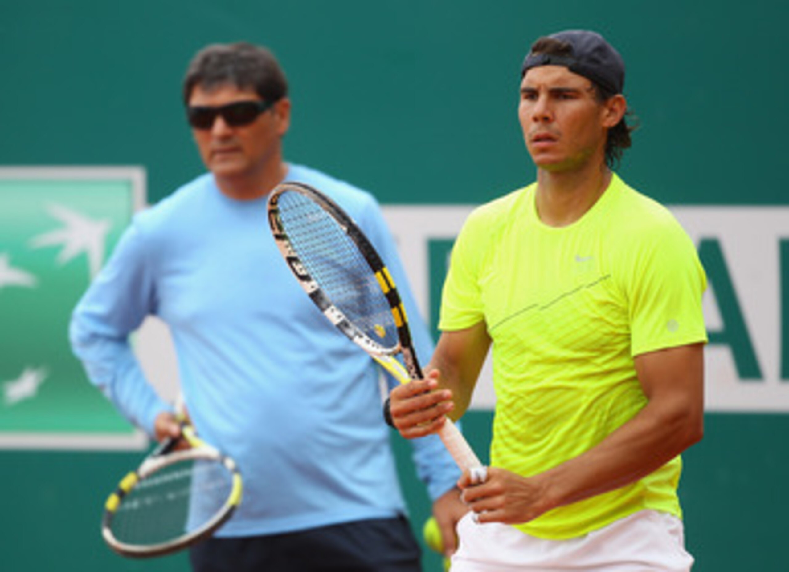 MONACO - APRIL 10: Rafael Nadal of Spain looks on as Toni Nadal, uncle & coach, watches on during Day One of the ATP Masters Series Tennis at the Monte Carlo Country Club on April 10, 2011 in Monte Carlo, Monaco. (Photo by Julian Finney/Getty Images) MONACO - APRIL 10: Rafael Nadal of Spain looks on as Toni Nadal, uncle & coach, watches on during Day One of the ATP Masters Series Tennis at the Monte Carlo Country Club on April 10, 2011 in Monte Carlo, Monaco. (Photo by Julian Finney/Getty Images)