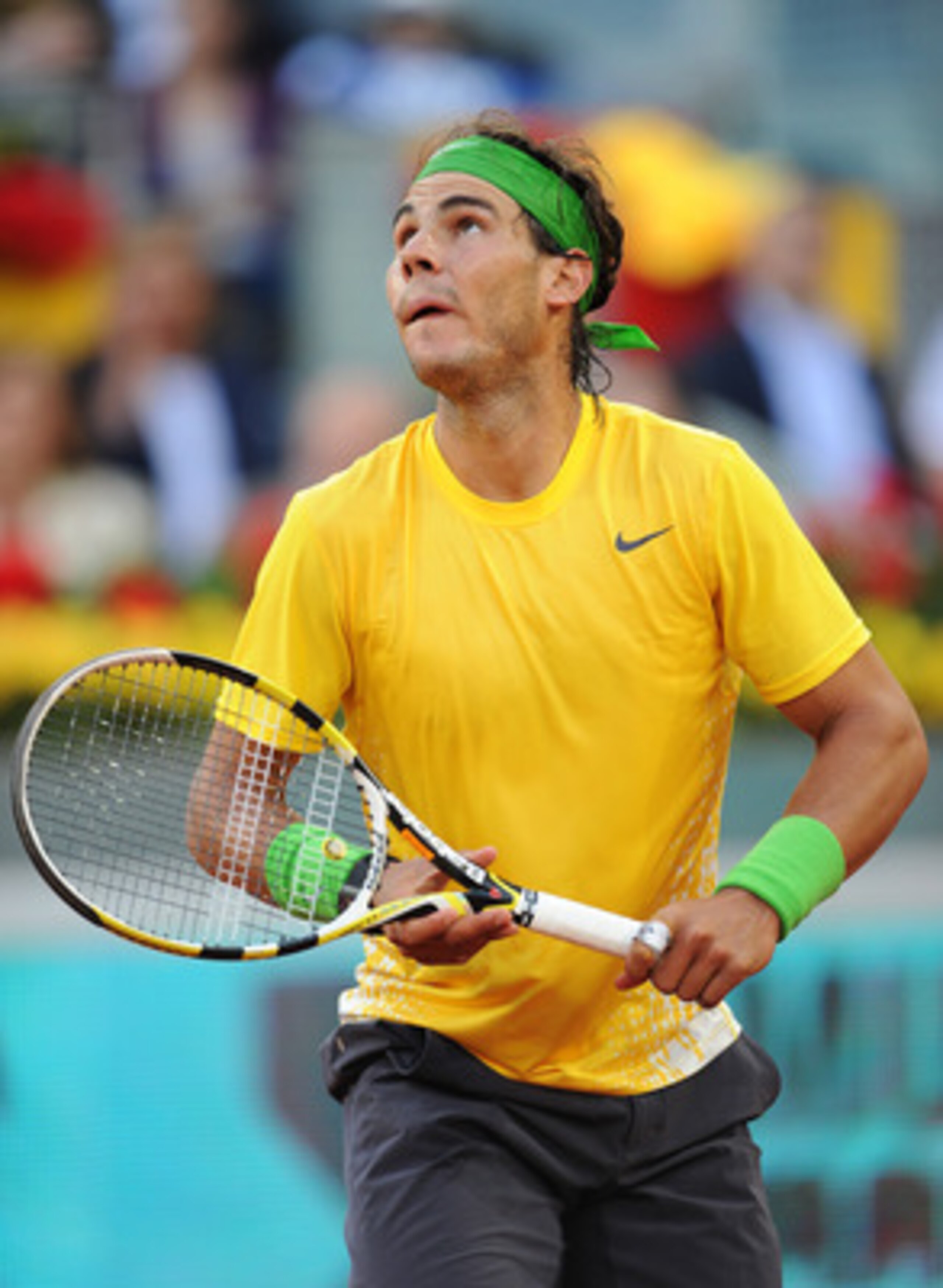 MADRID, SPAIN - MAY 08: Rafael Nadal of Spain follows a high ball in his final match against Novak Djokovic of Serbia during day eight of the Mutua Madrilena Madrid Open Tennis on May 8, 2011 in Madrid, Spain. Nadal lost his match in straight sets. (Pho MADRID, SPAIN - MAY 08: Rafael Nadal of Spain follows a high ball in his final match against Novak Djokovic of Serbia during day eight of the Mutua Madrilena Madrid Open Tennis on May 8, 2011 in Madrid, Spain. Nadal lost his match in straight sets. (Pho