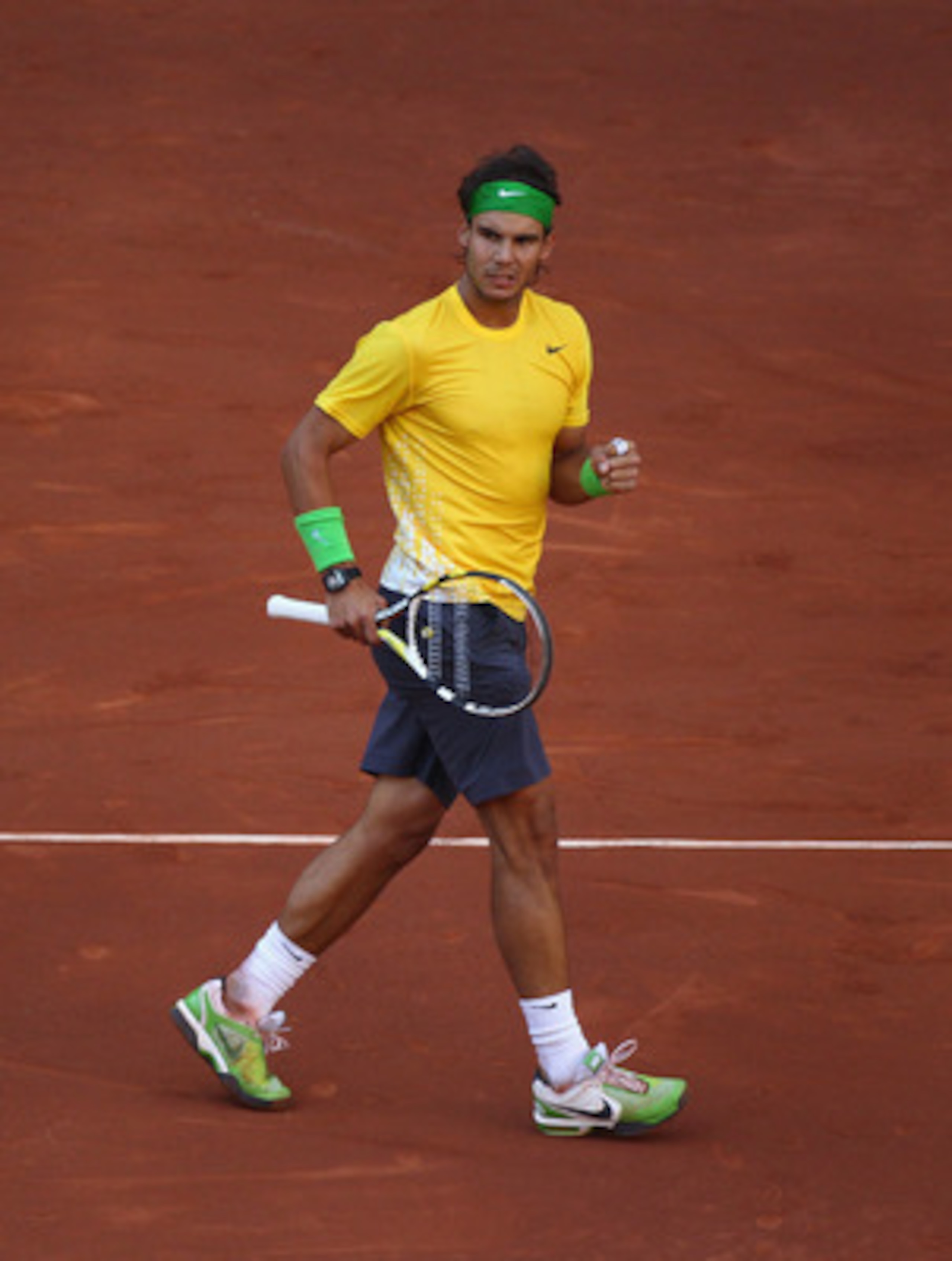 MADRID, SPAIN - MAY 08: Rafael Nadal of Spain celebrates winning a game in his match against Novak Djokovic of Serbia in the final during day nine of the Mutua Madrilena Madrid Open Tennis on May 8, 2011 in Madrid, Spain. (Photo by Julian Finney/Getty I MADRID, SPAIN - MAY 08: Rafael Nadal of Spain celebrates winning a game in his match against Novak Djokovic of Serbia in the final during day nine of the Mutua Madrilena Madrid Open Tennis on May 8, 2011 in Madrid, Spain. (Photo by Julian Finney/Getty I