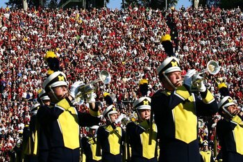 PASADENA, CA - JANUARY 01:  The United States Flag is seen at half mast in honor of President Gerald Ford, a former Michigan Wolverine, as the Michigan marching band plays the National Anthem prior to the game against the USC Trojans on January 1, 2007 at