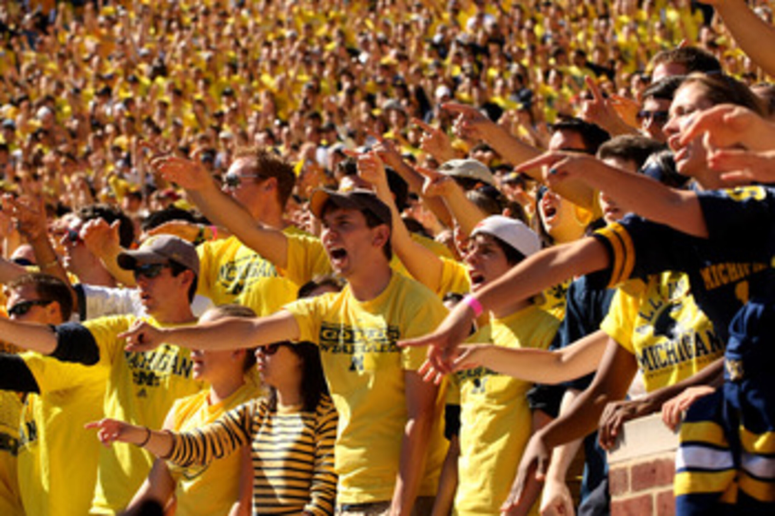 ANN ARBOR, MI - SEPTEMBER 19: The Michigan Wolverines student section cheers during the game with the Eastern Michigan Eagles at Michigan Stadium on September 19, 2009 in Ann Arbor, Michigan. (Photo by Stephen Dunn/Getty Images)