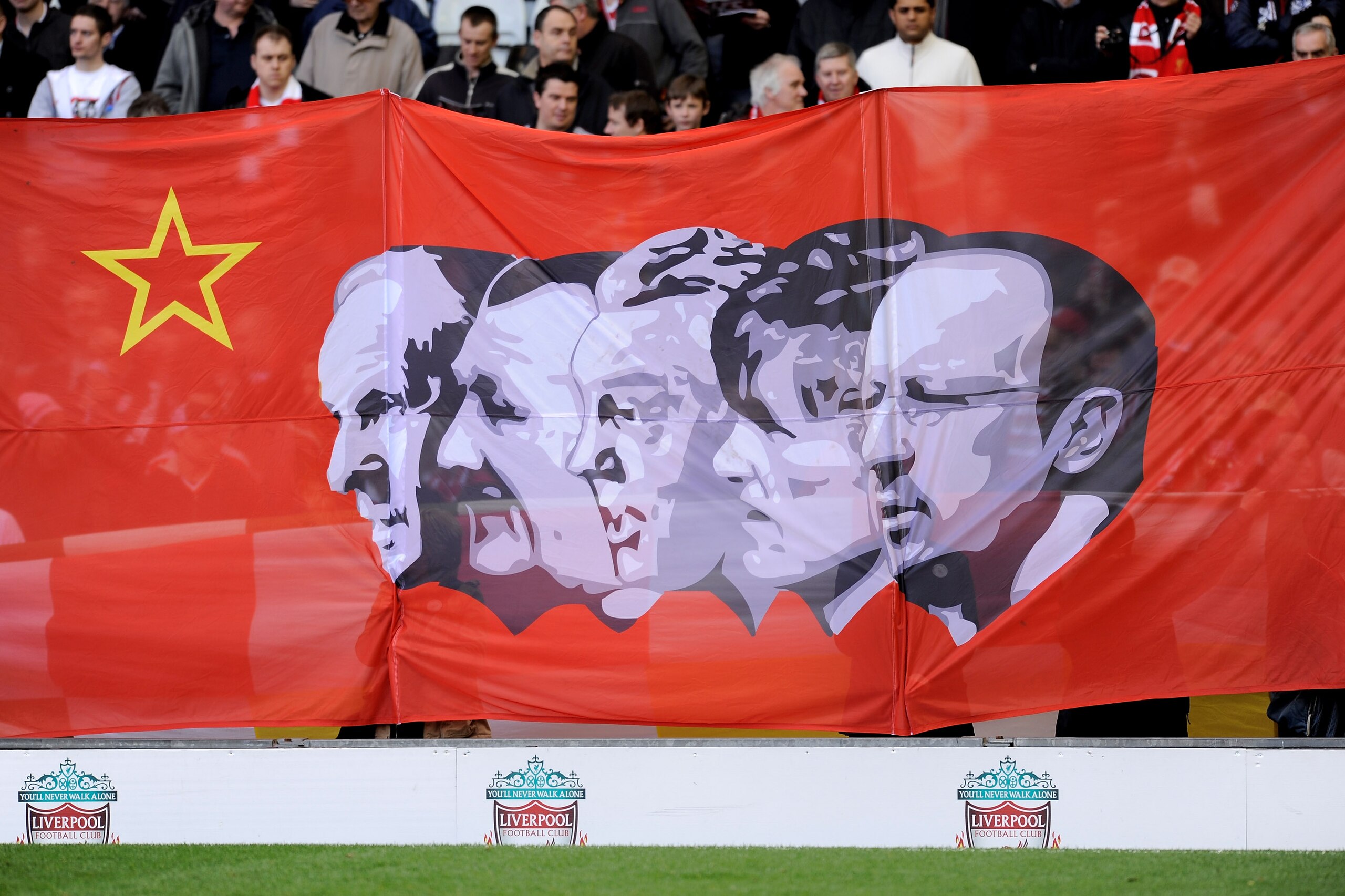 LIVERPOOL, ENGLAND - MARCH 28:  Liverpool fans display a banner showing Liverpool Managers past and present on the Kop prior to the Barclays Premier League match between Liverpool and Sunderland at Anfield on March 28, 2010 in Liverpool, England.  (Photo