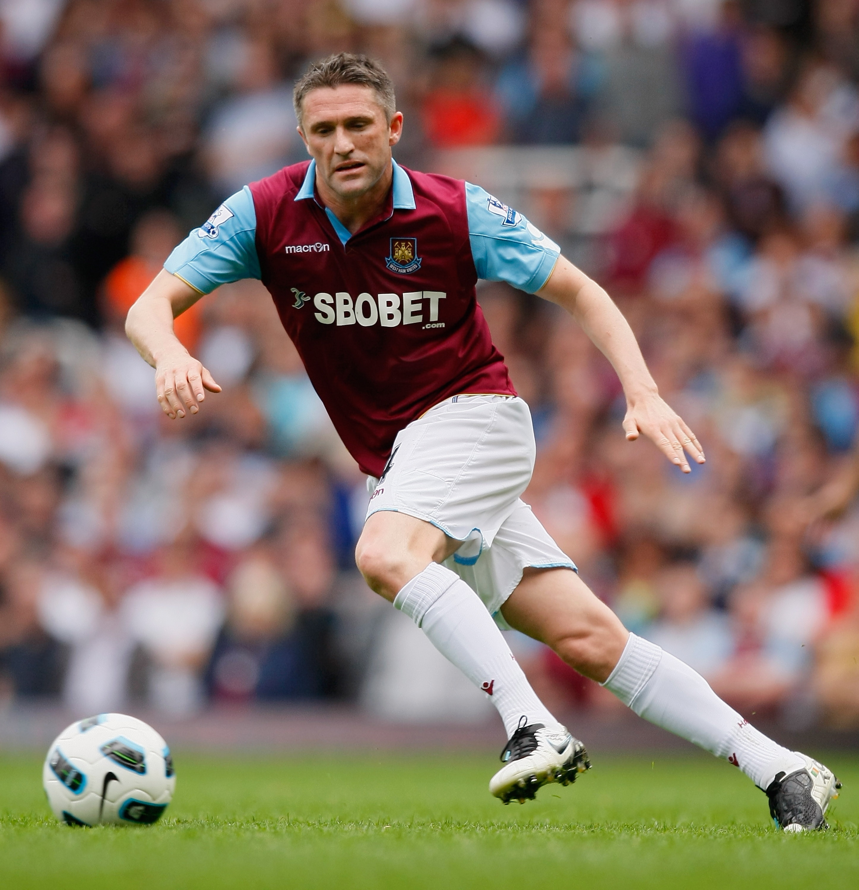 LONDON, ENGLAND - APRIL 16:  Robbie Keane of West Ham United runs with the ball during the Barclays Premier League match between West Ham United and Aston Villa at the Boleyn Ground on April 16, 2011 in London, England.  (Photo by Tom Dulat/Getty Images)