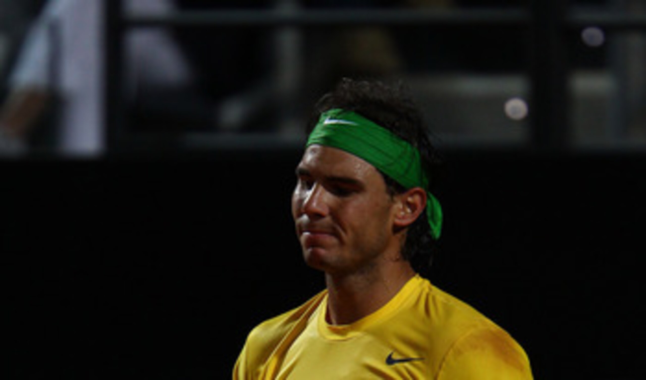 ROME, ITALY - MAY 15:  Rafael Nadal of Spain shows his dejection during the final against Novak Djokovic of Serbia during day eight of the Internazoinali BNL D'Italia at the Foro Italico Tennis Centre on May 15, 2011 in Rome, Italy.  (Photo by Clive Bruns