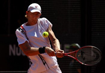 ROME, ITALY - MAY 10:  Kevin Anderson of South Africa plays a backhand return during his first round match against Sam Querrey of USA during day three of the Internazionali BNL d'Italia at the Foro Italico Tennis Centre on May 10, 2011 in Rome, Italy.  (P