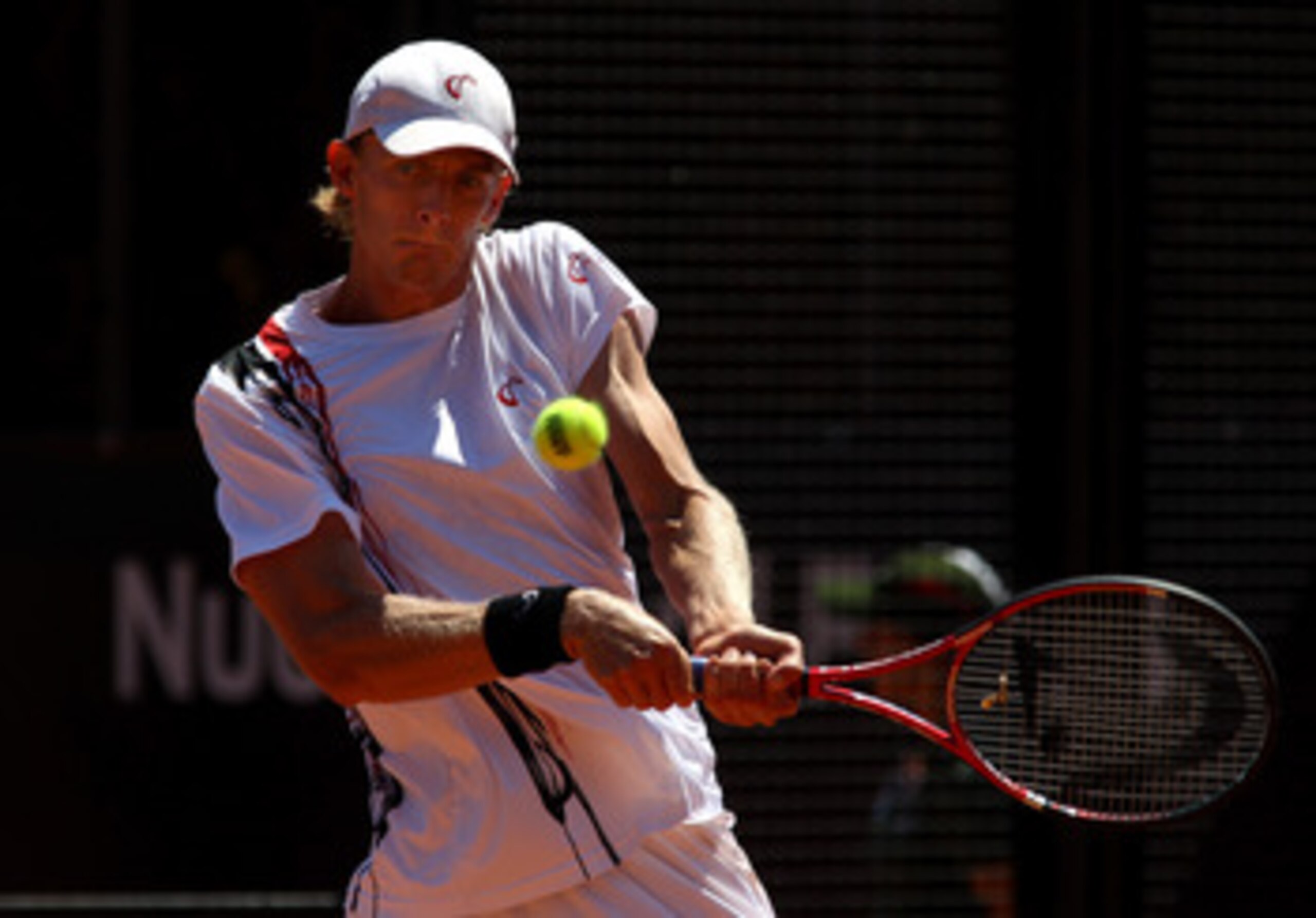 ROME, ITALY - MAY 10:  Kevin Anderson of South Africa plays a backhand return during his first round match against Sam Querrey of USA during day three of the Internazionali BNL d'Italia at the Foro Italico Tennis Centre on May 10, 2011 in Rome, Italy.  (P
