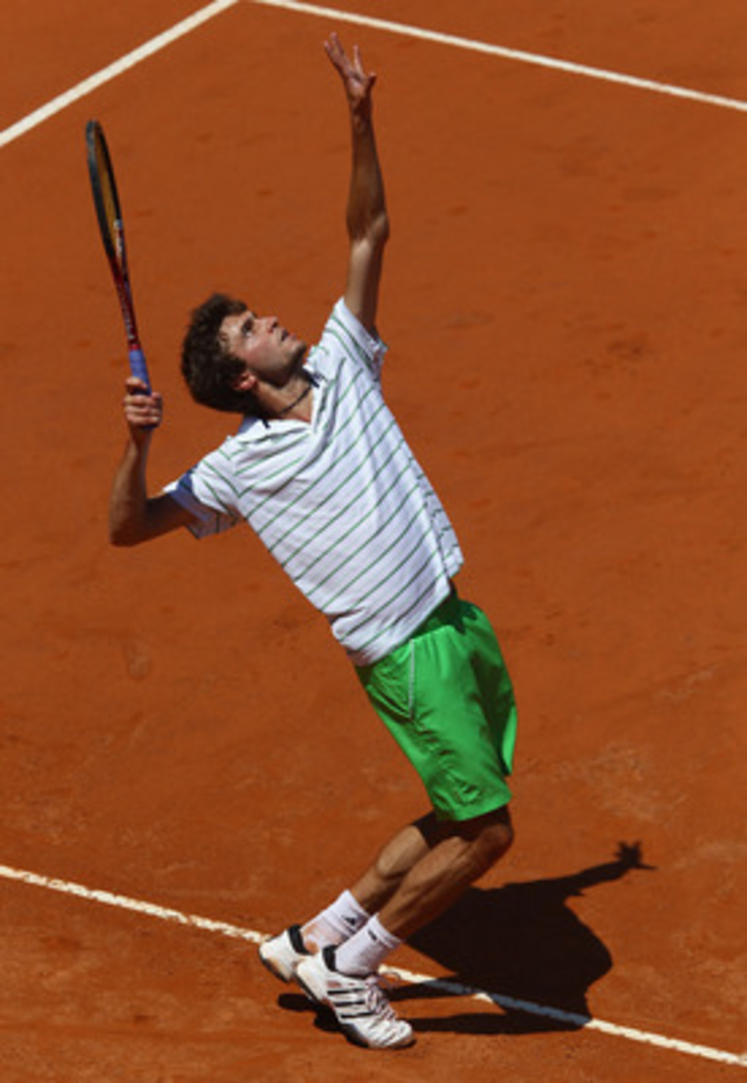 ROME, ITALY - MAY 09:  Gilles Simon of France serves during his first round match against Andy Roddick of the USA during day two of the Internazoinali BNL D'Italia at the Foro Italico Tennis Centre on May 9, 2011 in Rome, Italy.  (Photo by Clive Brunskill