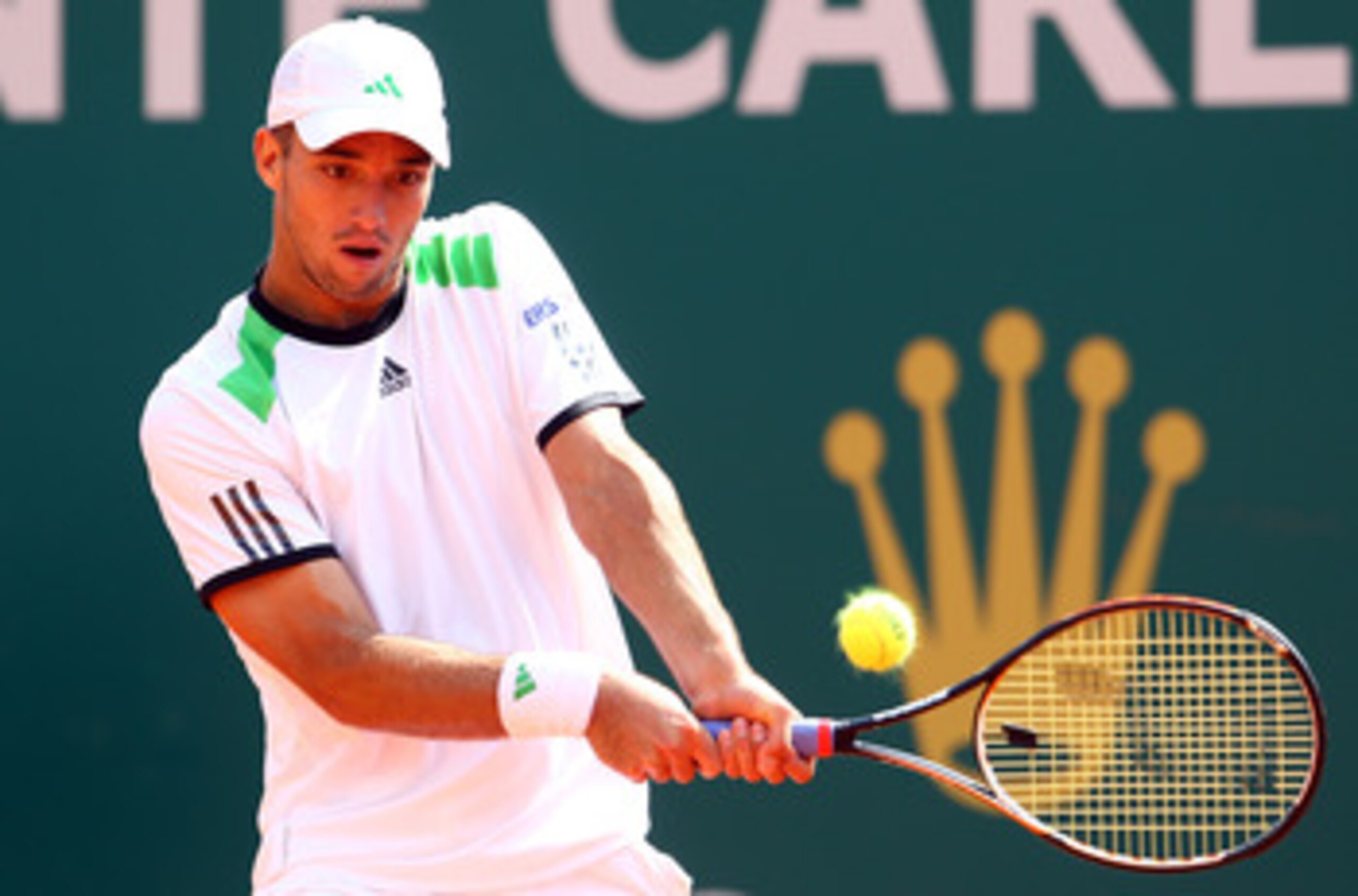 MONACO - APRIL 15:  Viktor Troicki of Serbia plays a backhand in his match against David Ferrer of Spain during Day Six of the ATP Masters Series Tennis at the Monte Carlo Country Club on April 15, 2011 in Monte Carlo, Monaco.  (Photo by Julian Finney/Get