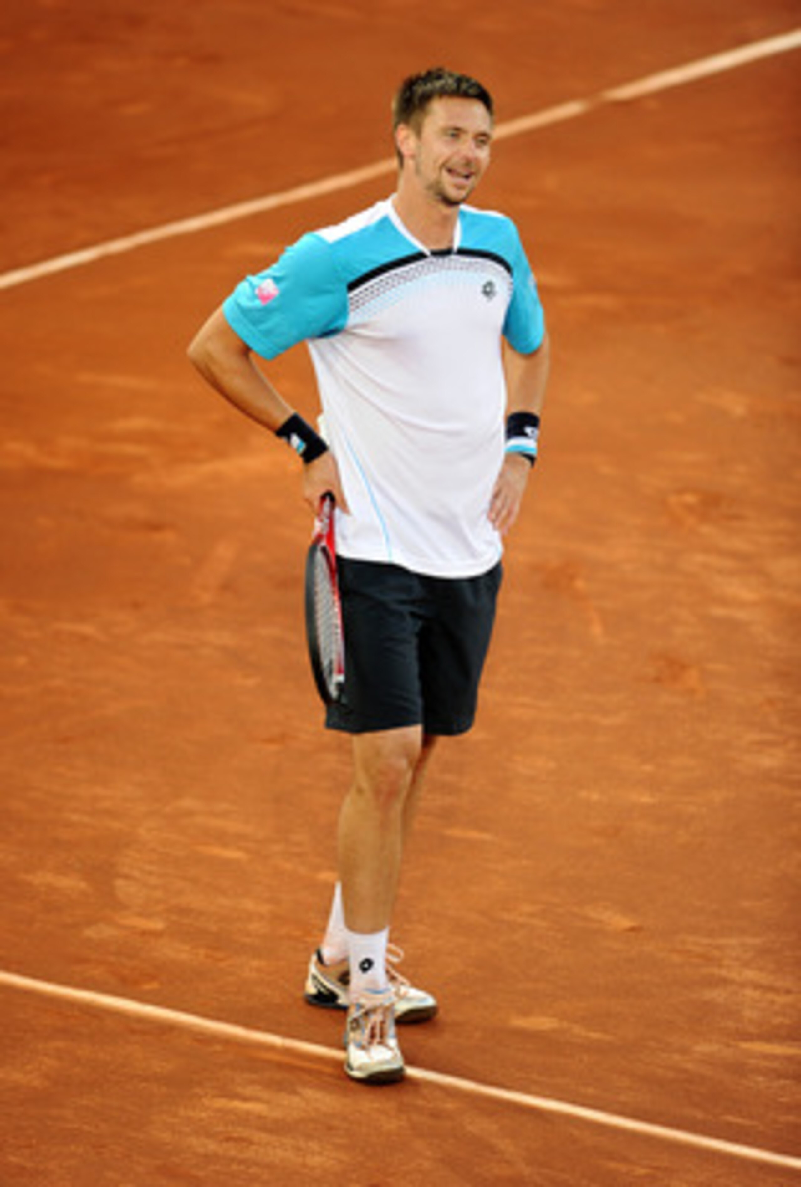 MADRID, SPAIN - MAY 06:  Robin Soderling of Sweden reacts in his match against Roger Federer of Switzerland during day seven of the Mutua Madrilena Madrid Open Tennis on May 6, 2011 in Madrid, Spain. Federer won the match in straight sets.  (Photo by Jasp