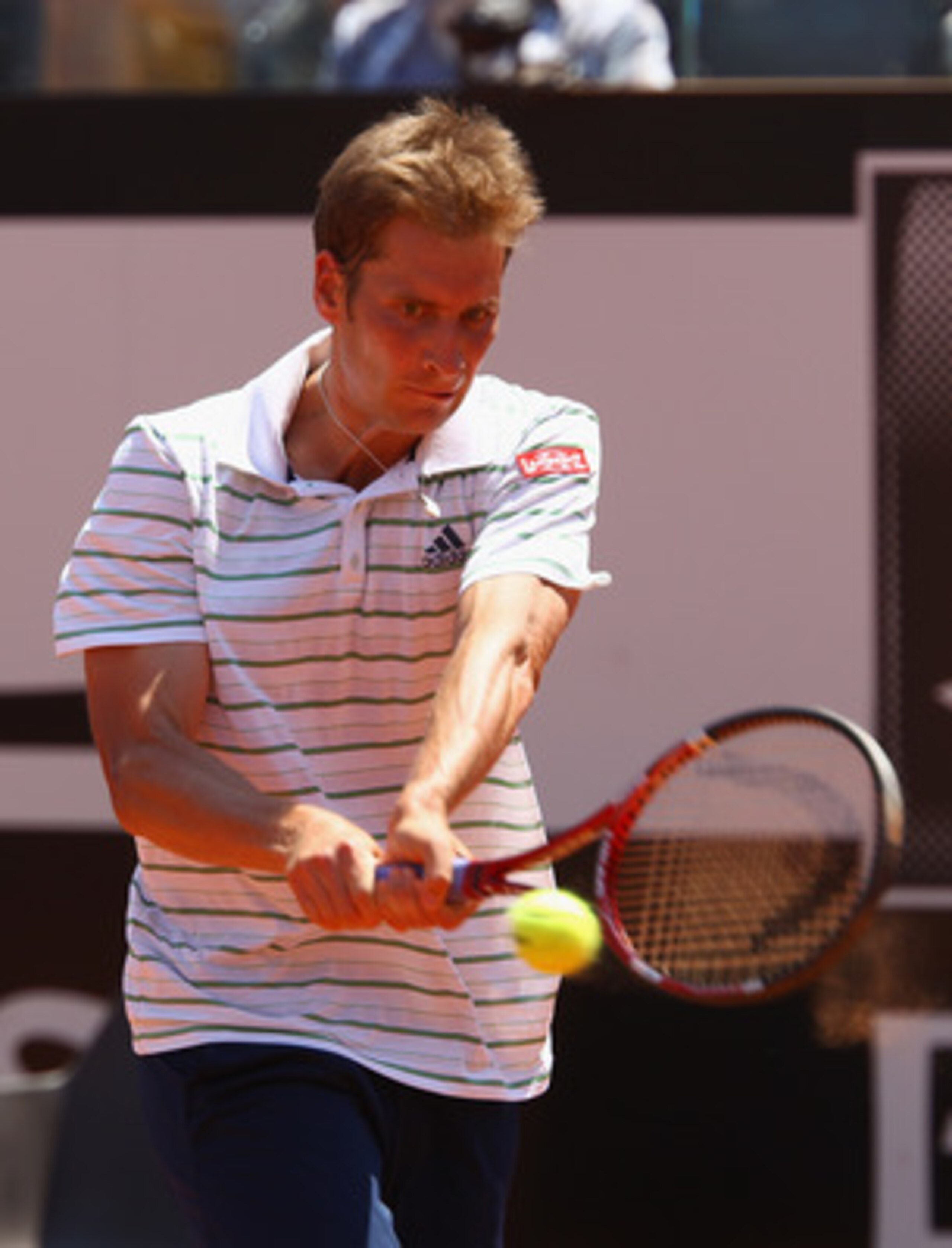 ROME, ITALY - MAY 13:  Florian Mayer of Germany plays a backhand during his quarter final match against Andy Murray of Great Britain during day six of the Internazoinali BNL D'Italia at the Foro Italico Tennis Centre  on May 13, 2011 in Rome, Italy.  (Pho