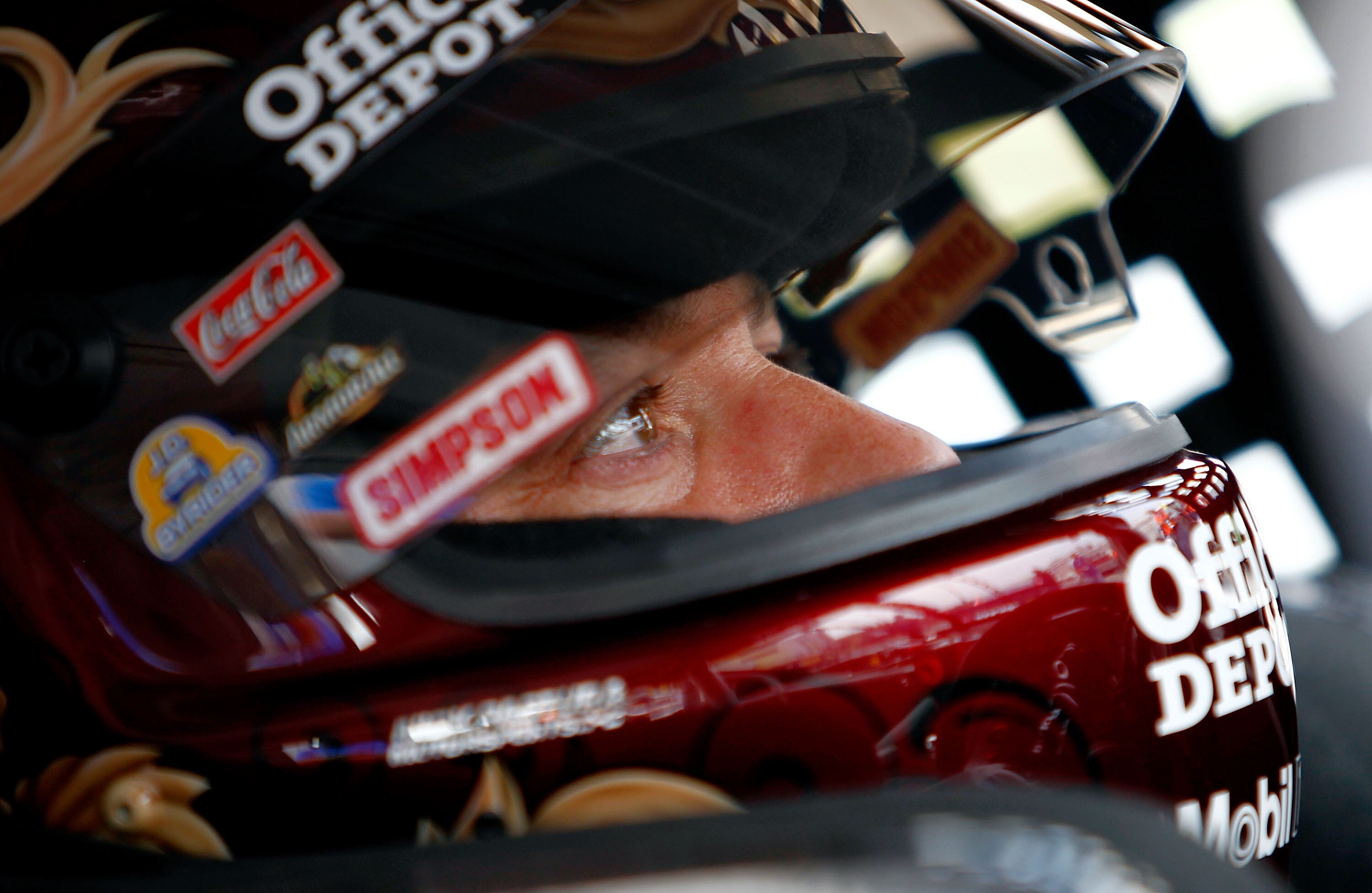 DOVER, DE - MAY 13: Tony Stewart, driver of the #14 Mobil 1/Office Depot Chevrolet, sits in his car during practice for the NASCAR Sprint Cup Series FedEx 400 Benefiting Autism Speaks at Dover International Speedway on May 13, 2011 in Dover, Delaware.  (P