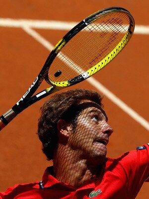 ROME, ITALY - MAY 14:  Richard Gasquet of France  serves during his semi final match against  Rafael Nadal of Spain during day seven of the Internazoinali BNL D'Italia at the Foro Italico Tennis Centre  on May 14, 2011 in Rome, Italy.  (Photo by Clive Bru