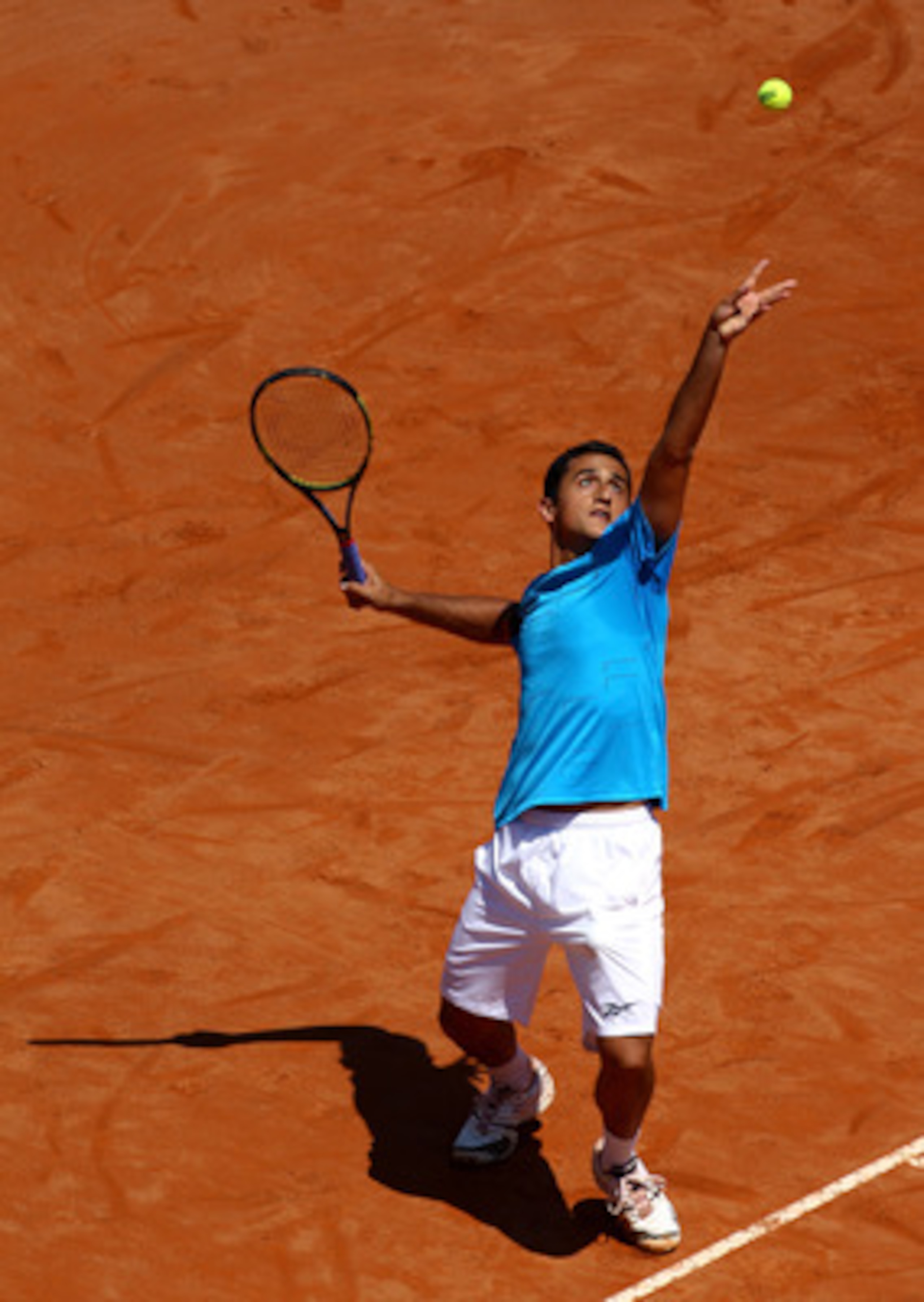 ROME, ITALY - MAY 10:  Nicolas Almagro of Spain serves during the his first round match against Simone Bolelli of Italy during day three of the Internazionali BNL d'Italia at the Foro Italico Tennis Centre on May 10, 2011 in Rome, Italy.  (Photo by Alex L