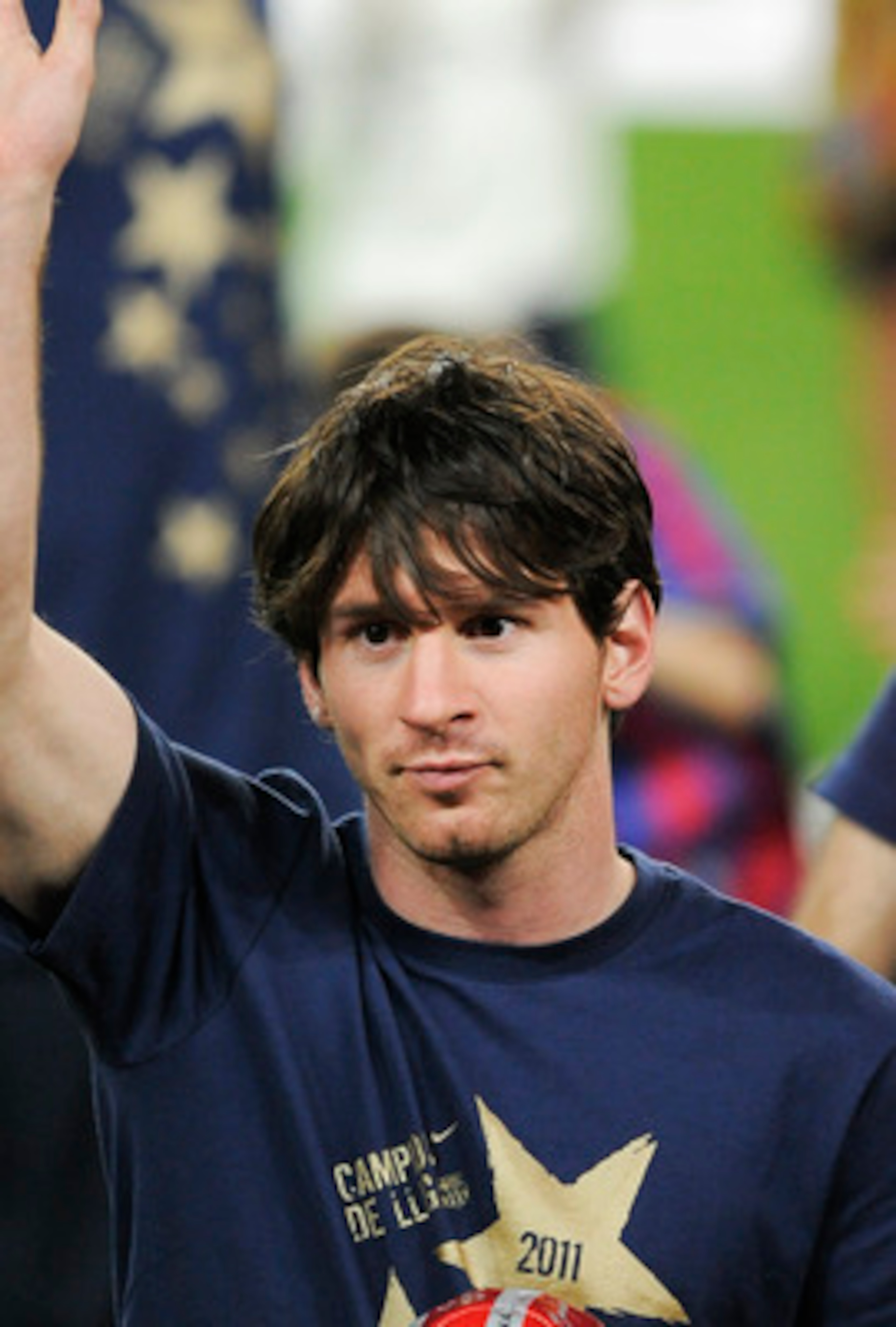 BARCELONA, SPAIN - MAY 13:  Lionel Messi of FC Barcelona celebrates during the celebrations for winning the Spanish Liga at the Camp Nou Stadium on May 13, 2011 in Barcelona, Spain.  (Photo by David Ramos/Getty Images)