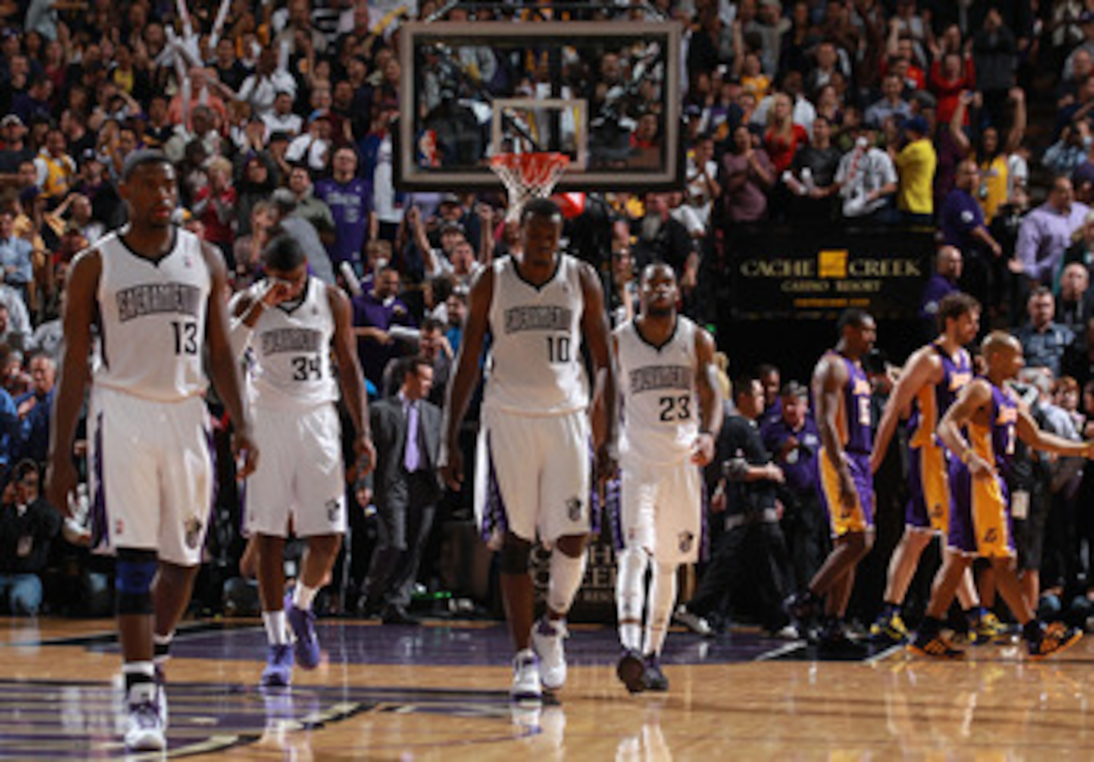 SACRAMENTO, CA - APRIL 13:  Members of the Sacramento Kings look on against the Los Angeles Lakers on April 13, 2011 at Power Balence Pavilion in Sacramento, California. NOTE TO USER: User expressly acknowledges and agrees that, by downloading and/or usin