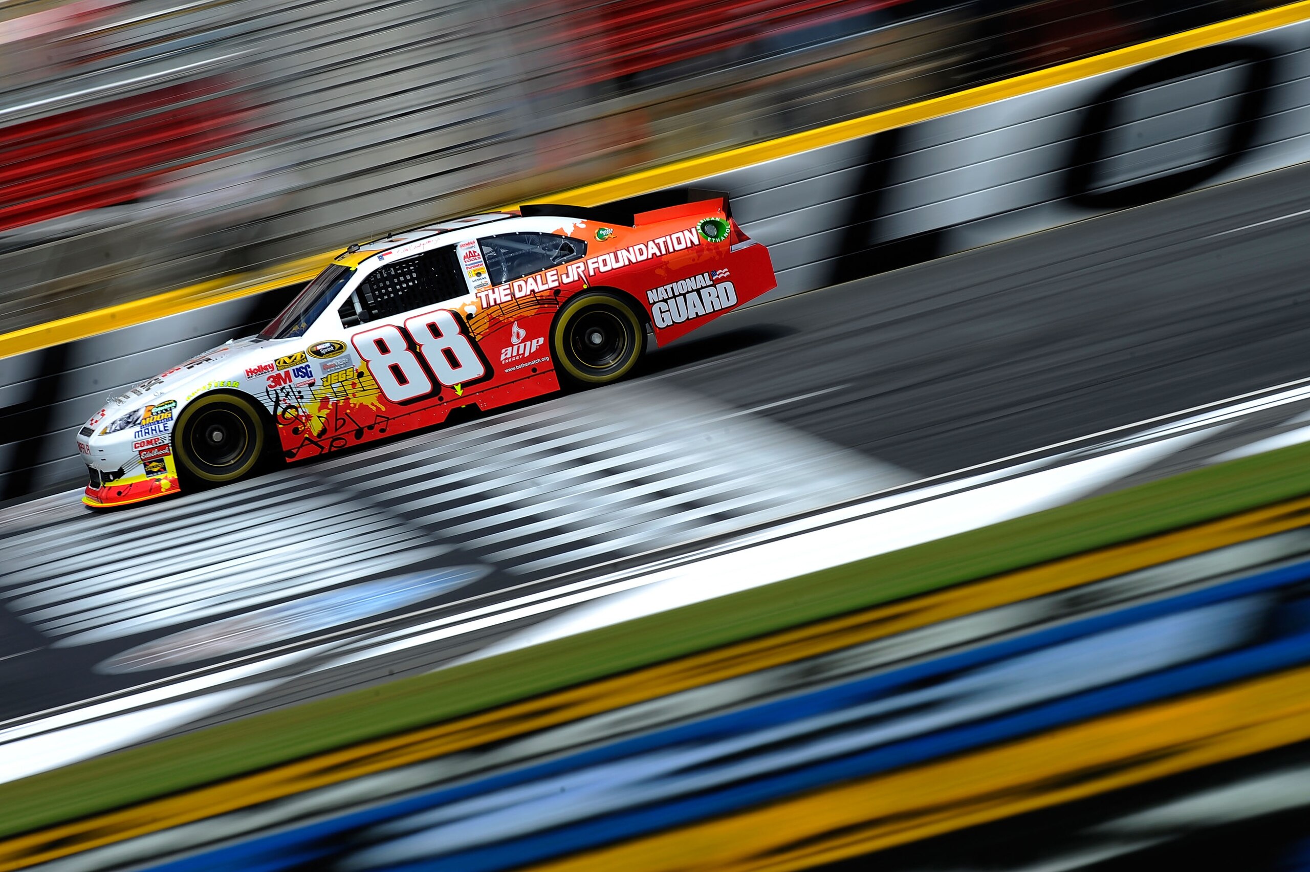 CHARLOTTE, NC - MAY 20:  Dale Earnhardt Jr. drives the #88 Dale Jr. Foundation/VH1 Save the Music/Amp Energy Sugar-Free/National Guard Chevrolet during practice for the NASCAR Sprint Showdown at Charlotte Motor Speedway on May 20, 2011 in Charlotte, North