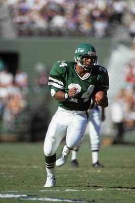 SAN DIEGO, CA - DECEMBER 2:  Running back Freeman McNeil #24 of the New York Jets runs the ball during a game against the San Diego Chargers at Jack Murphy Stadium on December 2, 1990 in San Diego, California.  The San Diego Chargers won 38-17  (Photo by 