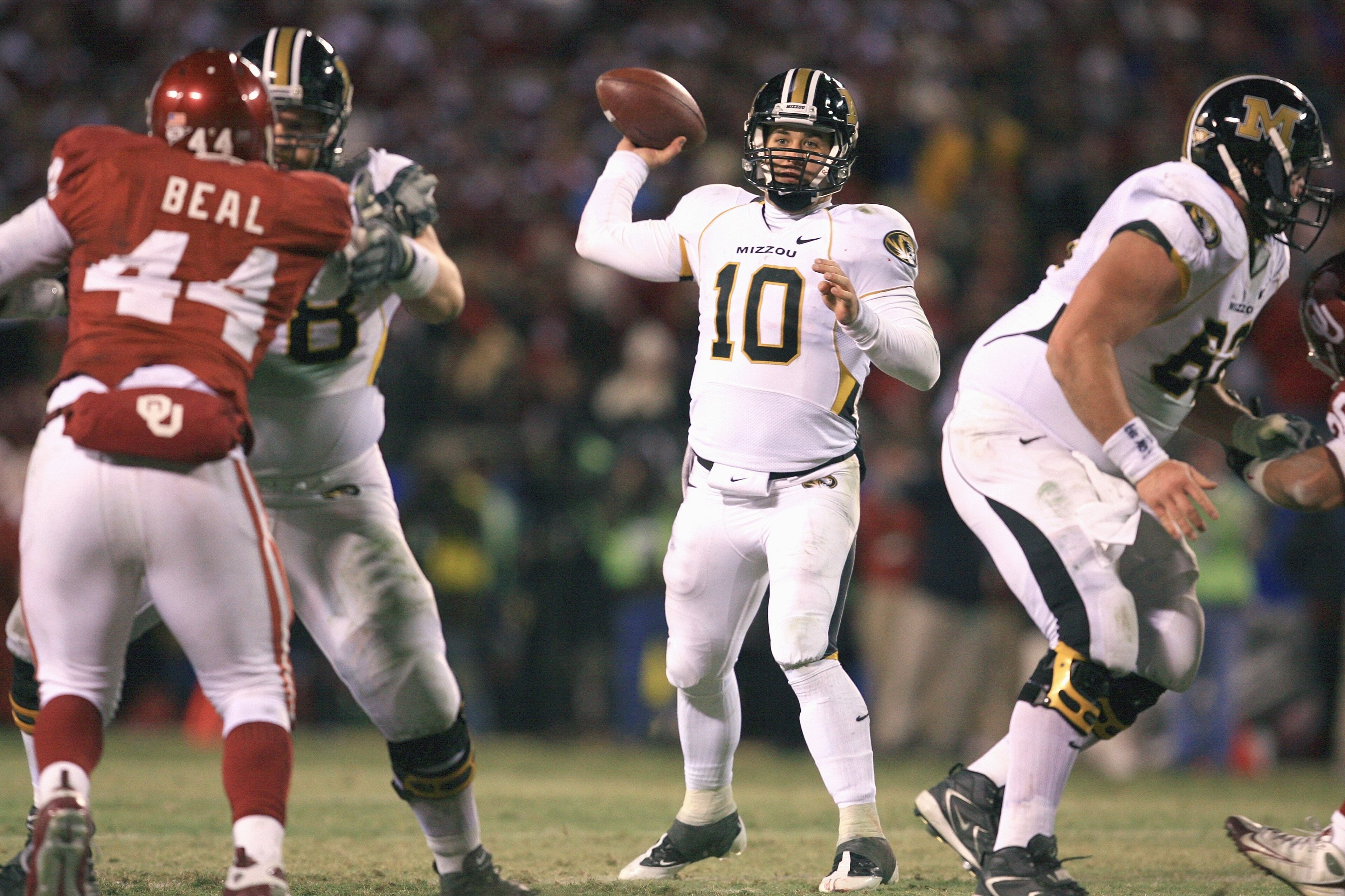 KANSAS CITY, MO - DECEMBER 06: Quarterback Chase Daniel #10 of the Missouri Tigers passes the ball during the game against the Oklahoma Sooners on December 6, 2008 at Arrowhead Stadium in Kansas City, Missouri. (Photo by Jamie Squire/Getty Images)