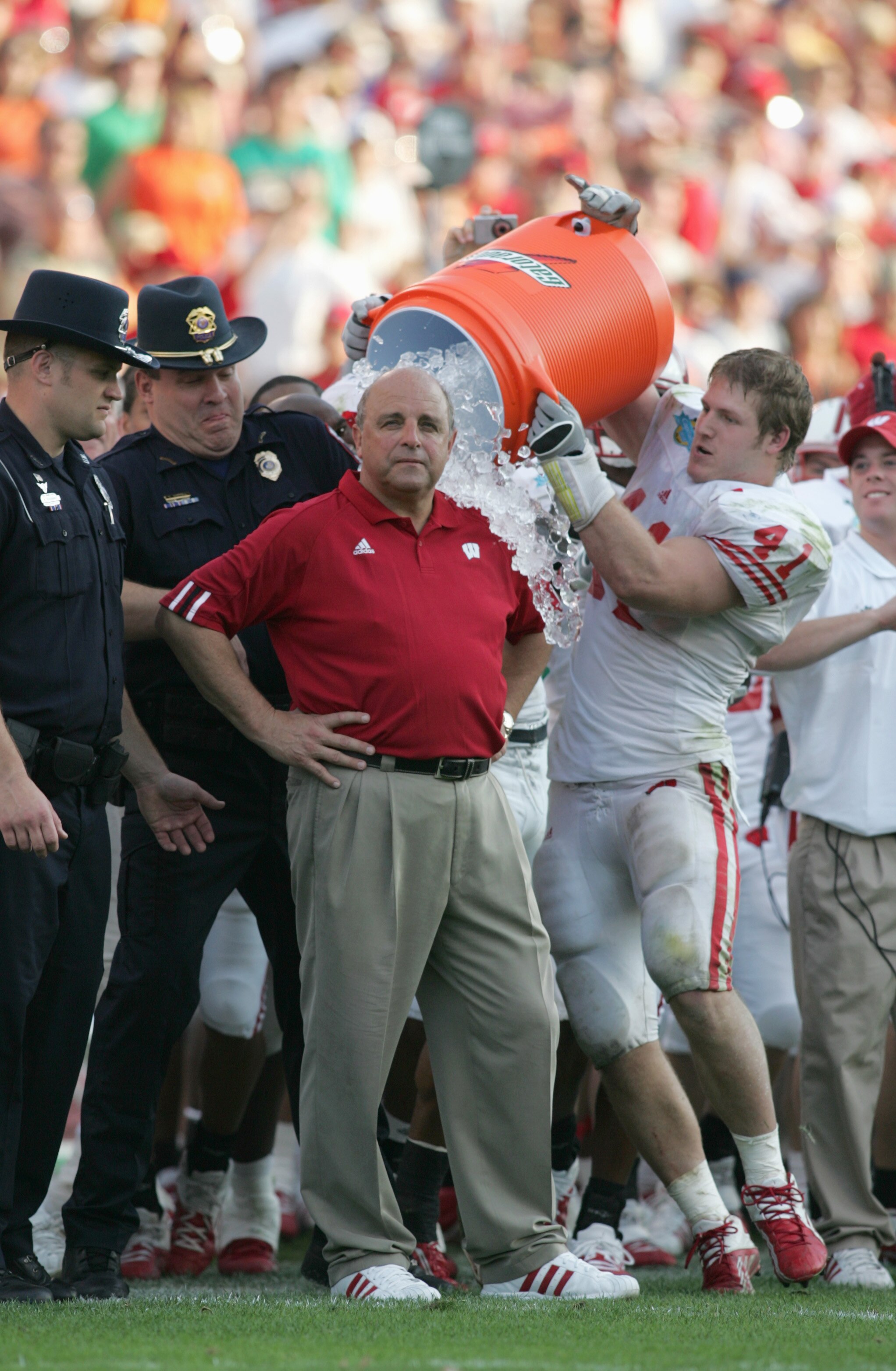 ORLANDO, FL - JANUARY 2:  Head coach Barry Alvarez of the Wisconsin Badgers gets the gatorade dousing on the sidelines during the Capital One Bowl against the Auburn Tigers at the Florida Citrus Bowl on January 2, 2006 in Orlando, Florida. (Photo by Doug