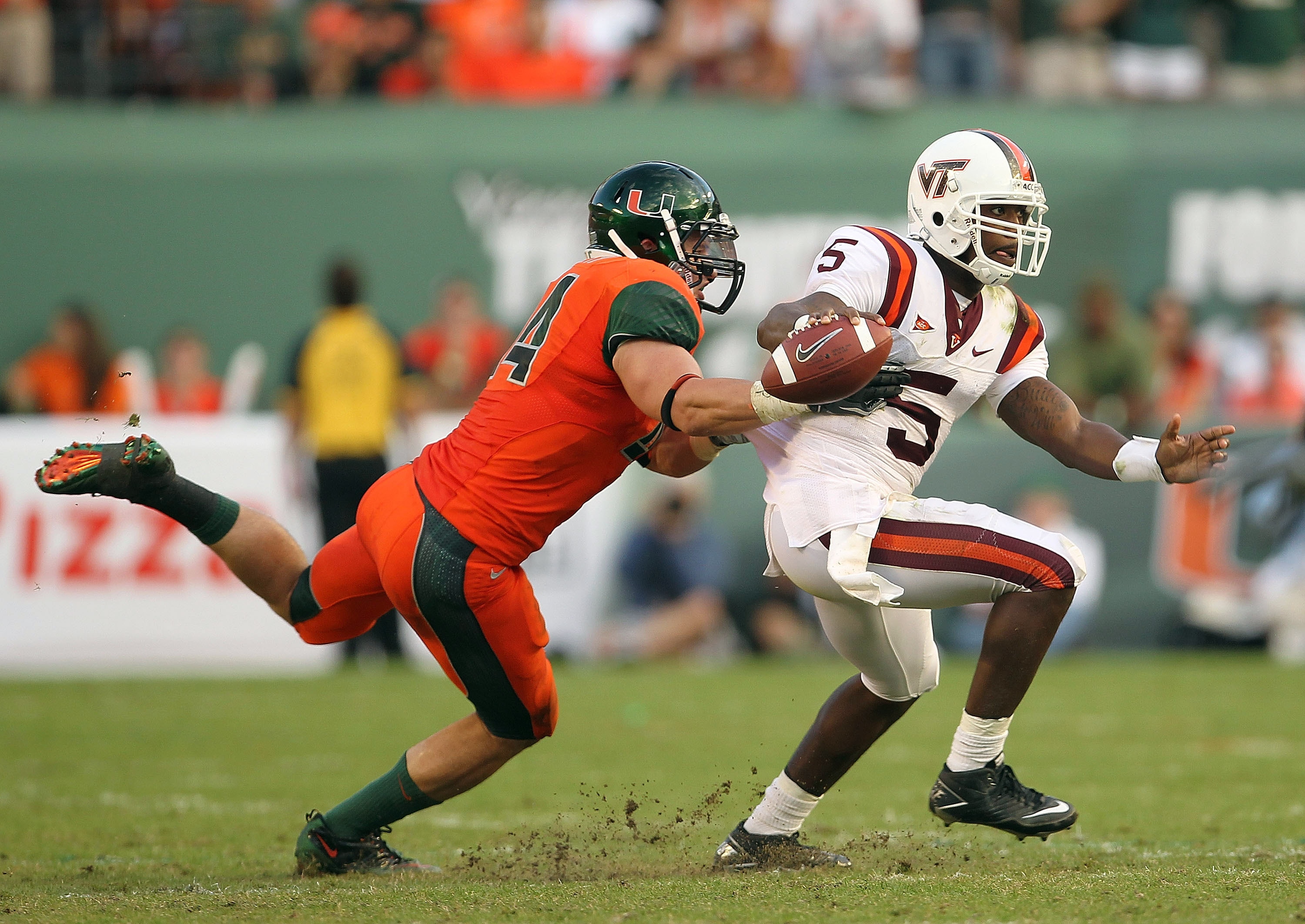 MIAMI - NOVEMBER 20:  Tyrod Taylor #5 of the Virginia Tech Hokies runs with the ball during a game against the Miami Hurricanes at Sun Life Stadium on November 20, 2010 in Miami, Florida.  (Photo by Mike Ehrmann/Getty Images)