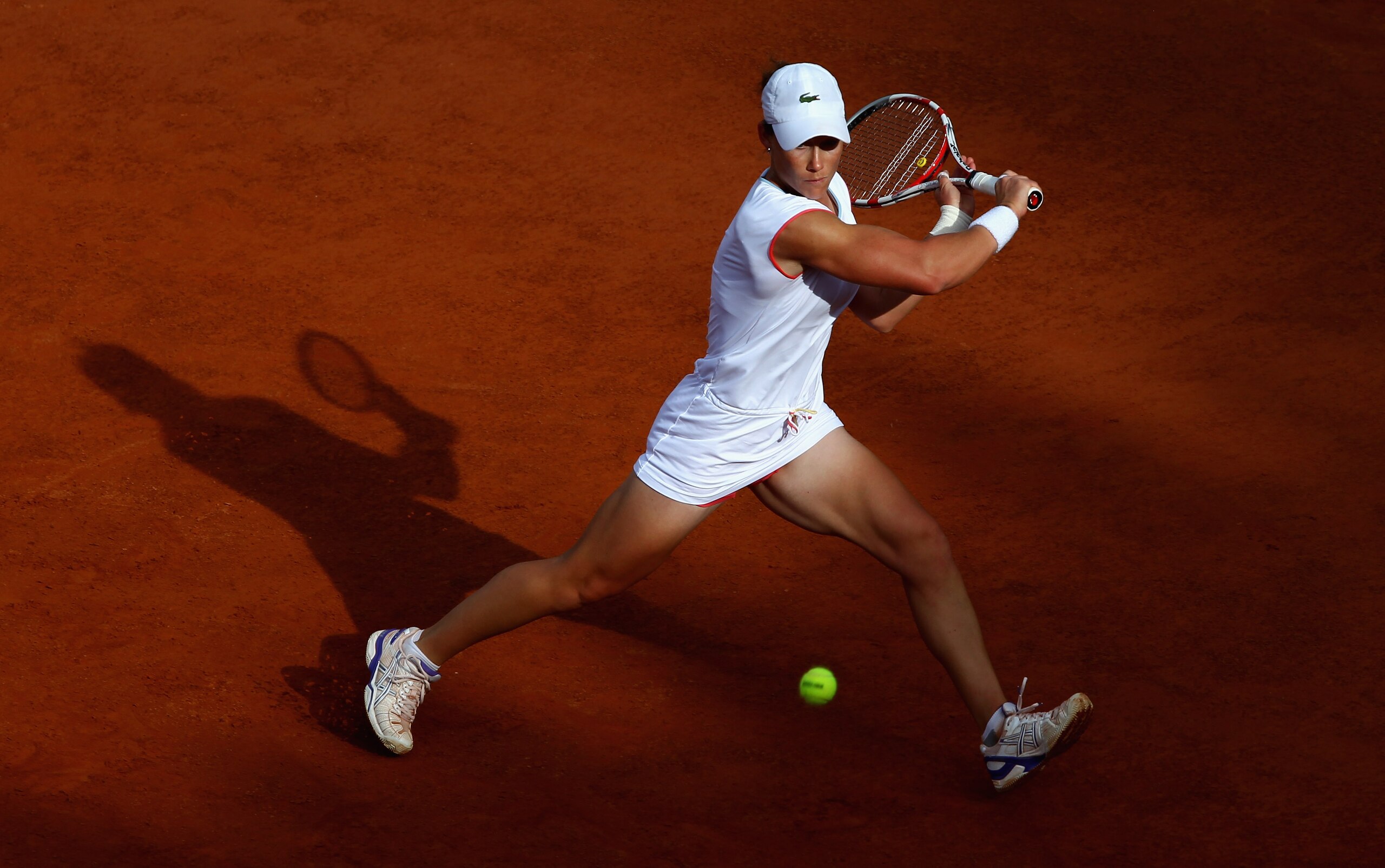 ROME, ITALY - MAY 15:  Samantha Stosur of Australia runs to play a backhand during the final against Maria Sharapova of Russia during day eight of the Internazoinali BNL D'Italia at the Foro Italico Tennis Centre on May 15, 2011 in Rome, Italy.  (Photo by