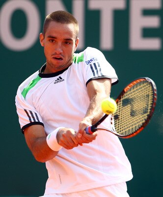 MONACO - APRIL 15:  Viktor Troicki of Serbia plays a backhand in his match against David Ferrer of Spain during Day Six of the ATP Masters Series Tennis at the Monte Carlo Country Club on April 15, 2011 in Monte Carlo, Monaco.  (Photo by Julian Finney/Get