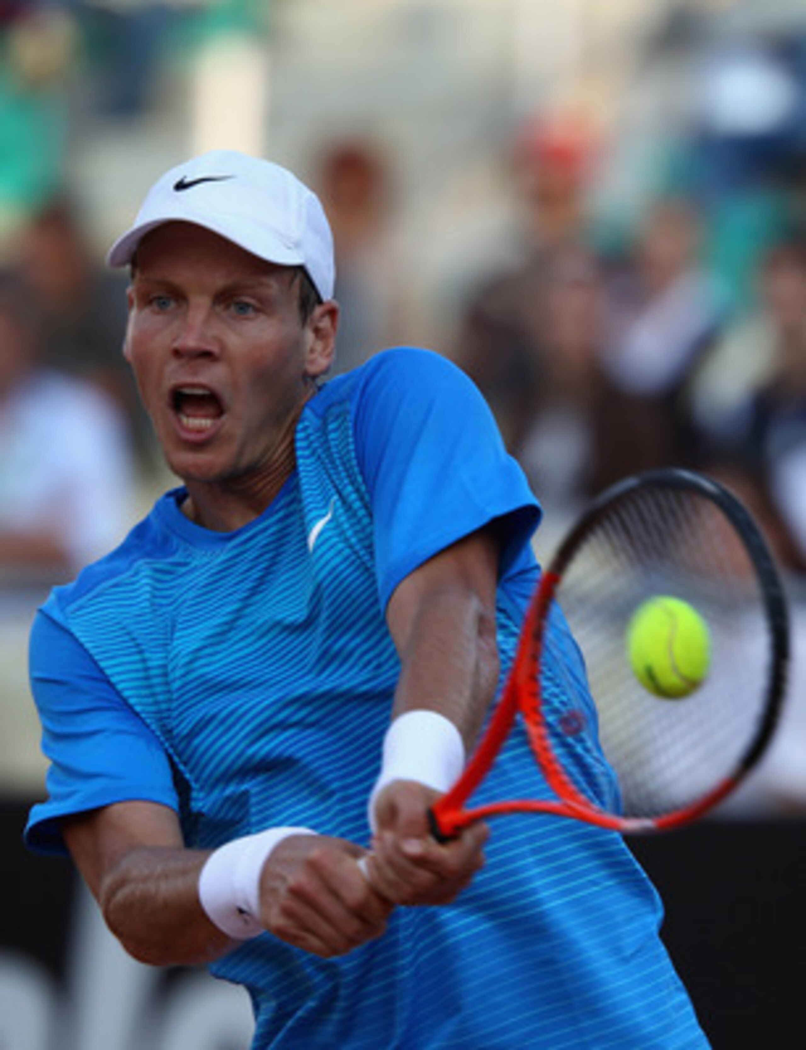 ROME, ITALY - MAY 13: Tomas Berdych of Czech Republic plays a backhand during his quarter final match against Richard Gasquet of France during day six of the Internazoinali BNL D'Italia at the Foro Italico Tennis Centre on May 13, 2011 in Rome, Italy. ROME, ITALY - MAY 13: Tomas Berdych of Czech Republic plays a backhand during his quarter final match against Richard Gasquet of France during day six of the Internazoinali BNL D'Italia at the Foro Italico Tennis Centre on May 13, 2011 in Rome, Italy.